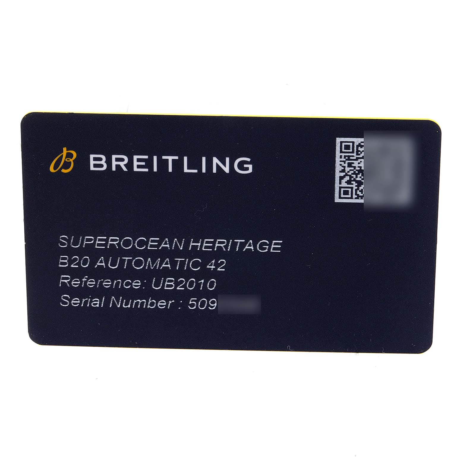The image shows a reference and serial number card for the Breitling Superocean UB201012/BG53/154A Men
s Steel and Gold (two tone) Black Dial UB201012/BG53/154A Men
s Steel and Gold (two tone) Black Dial Heritage B20 Automatic 42 watch.