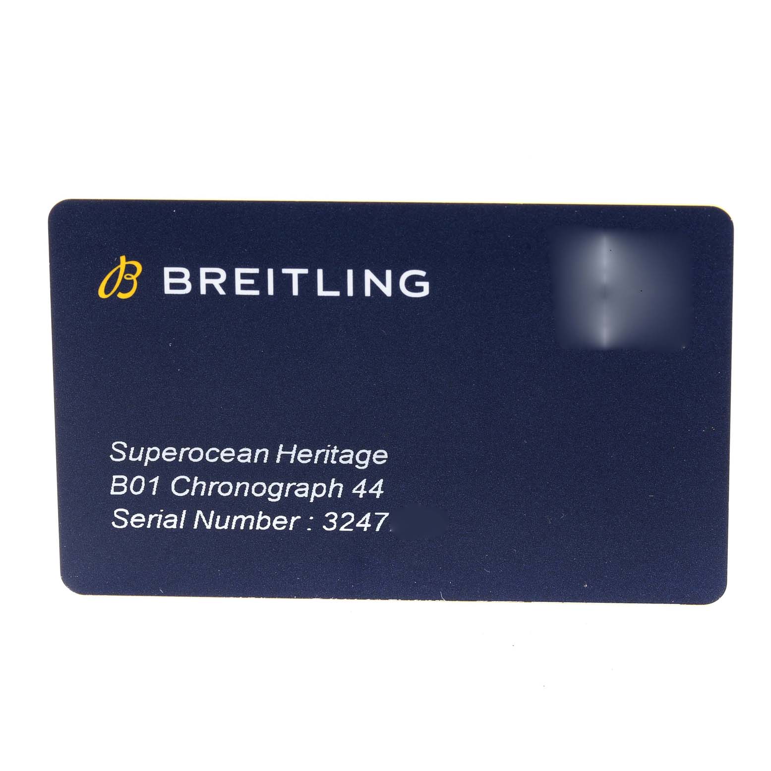 The image shows a Breitling warranty card for the Superocean Heritage B01 Chronograph 44 watch, containing the serial number.