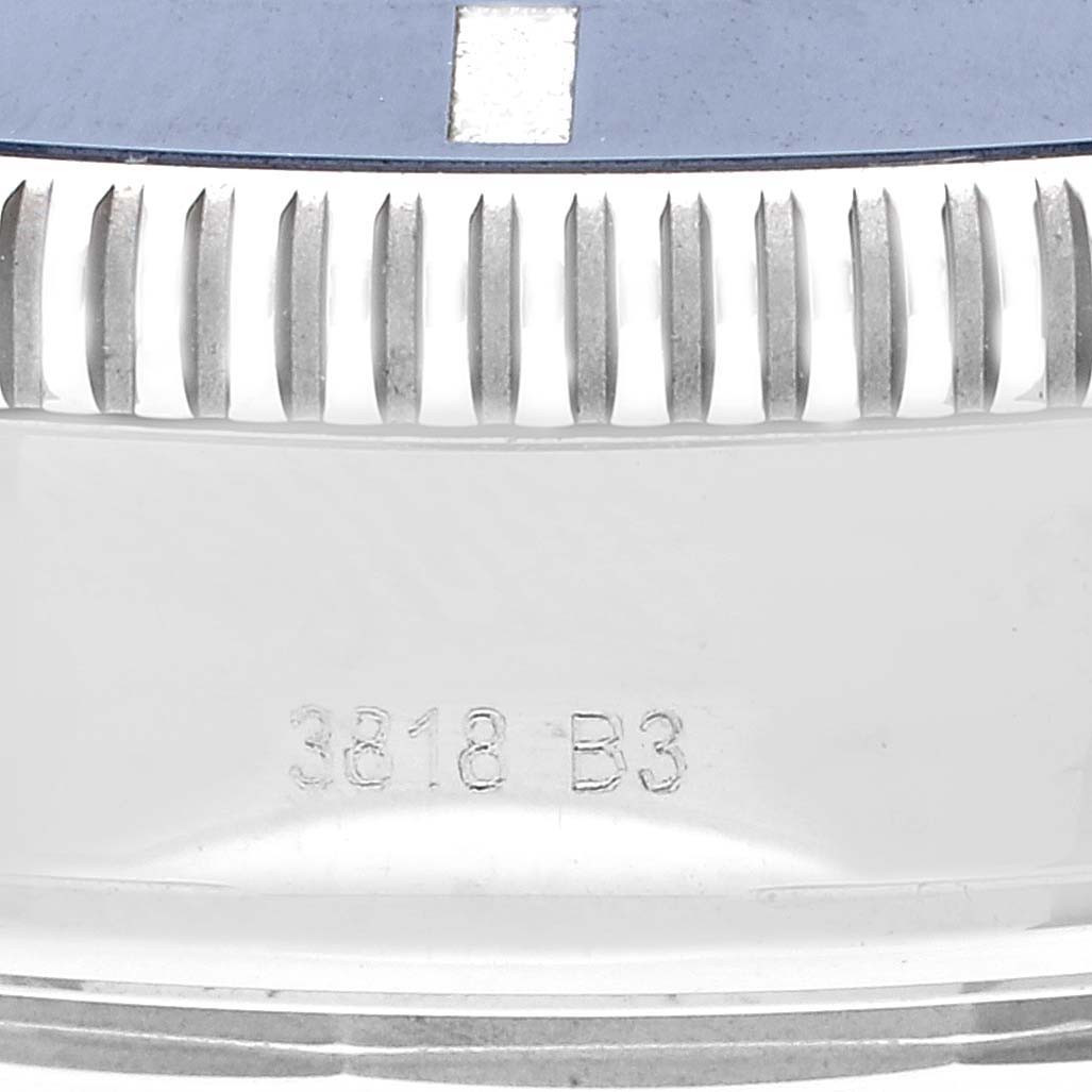 This is a close-up image showing the bezel and case of the Breitling Superocean AB0162 Men's Stainless Steel Blue Dial AB0162 Men's Stainless Steel Blue Dial watch, engraved with "3818 B3."