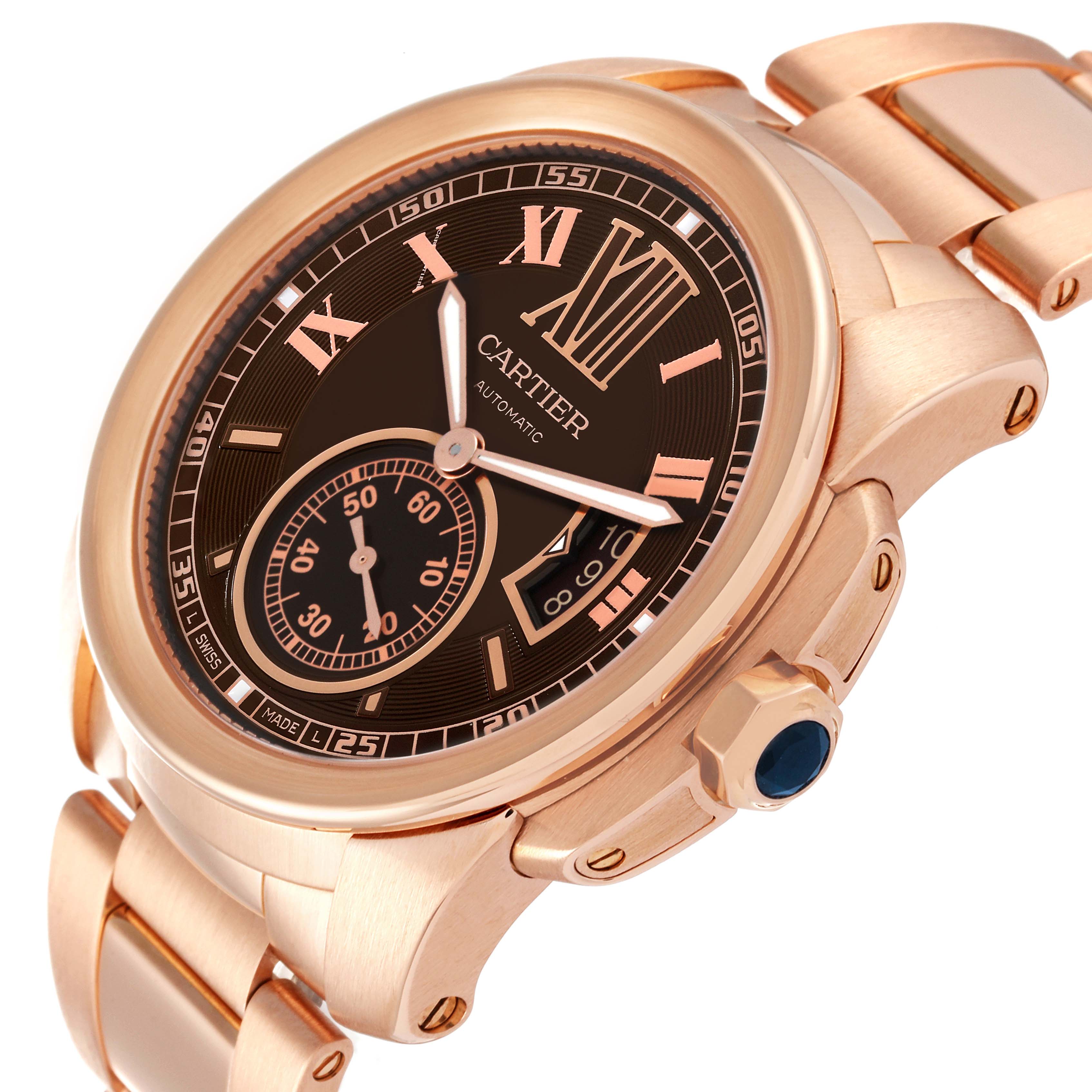 The image shows a Calibre de Cartier model watch by Cartier, viewed from an angled close-up, highlighting its face and part of its bracelet.