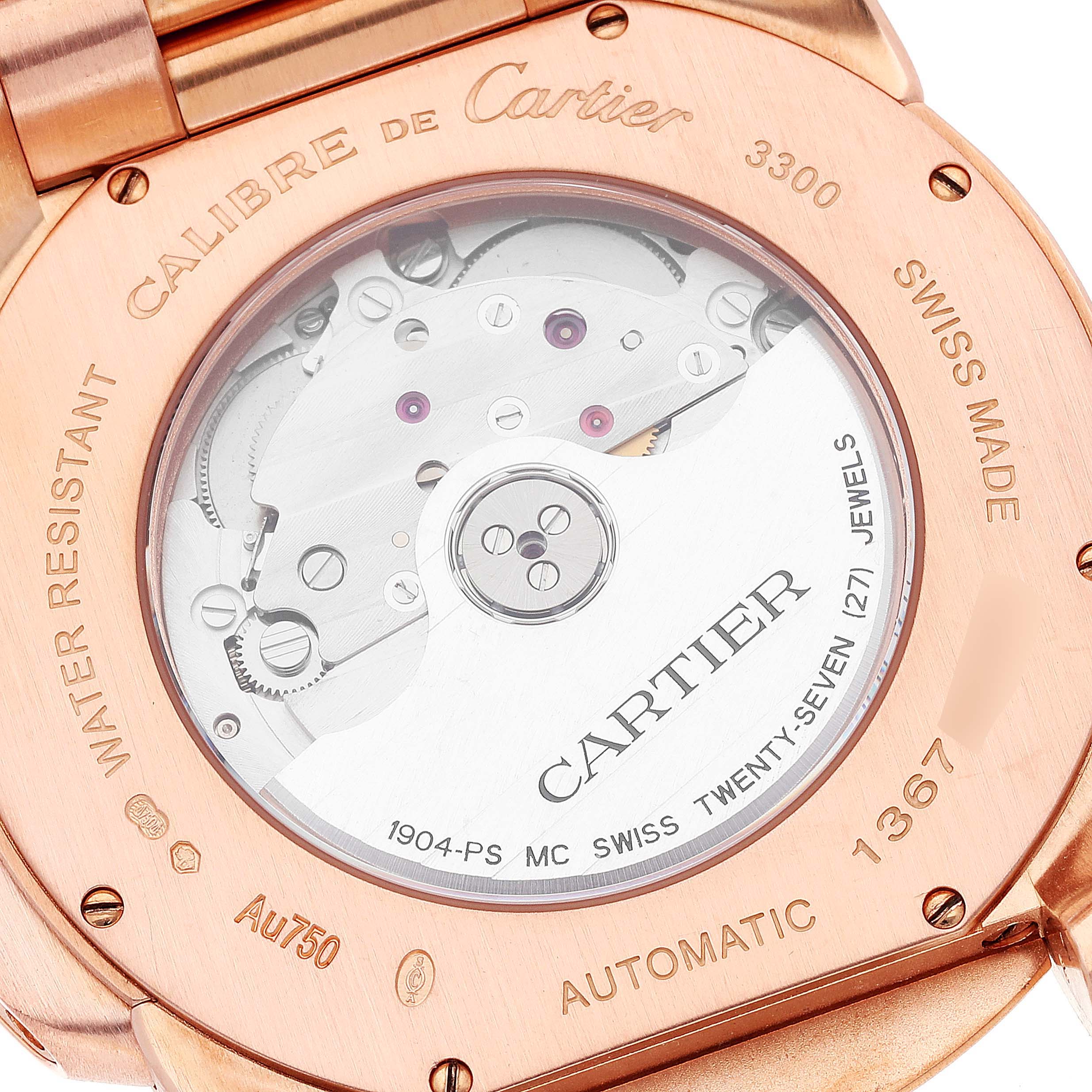 The image shows the back view of the Calibre de Cartier watch by Cartier, revealing its movement mechanism.