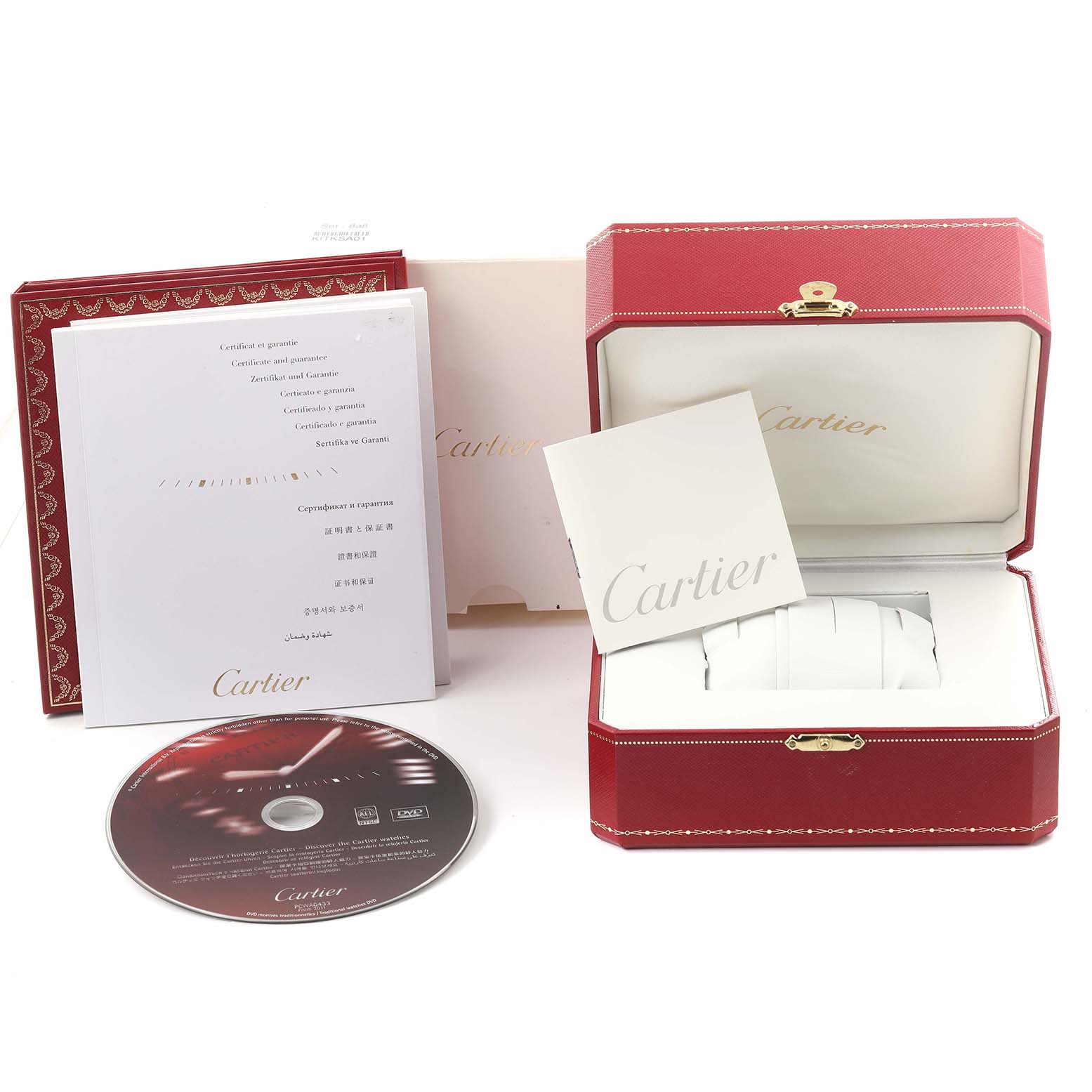 The image shows the Cartier Pasha W3140025 Women
s Stainless Steel Silver Dial W3140025 Women
s Stainless Steel Silver Dial watch
s box, warranty booklet, instruction manual, and a CD, all at a frontal angle.