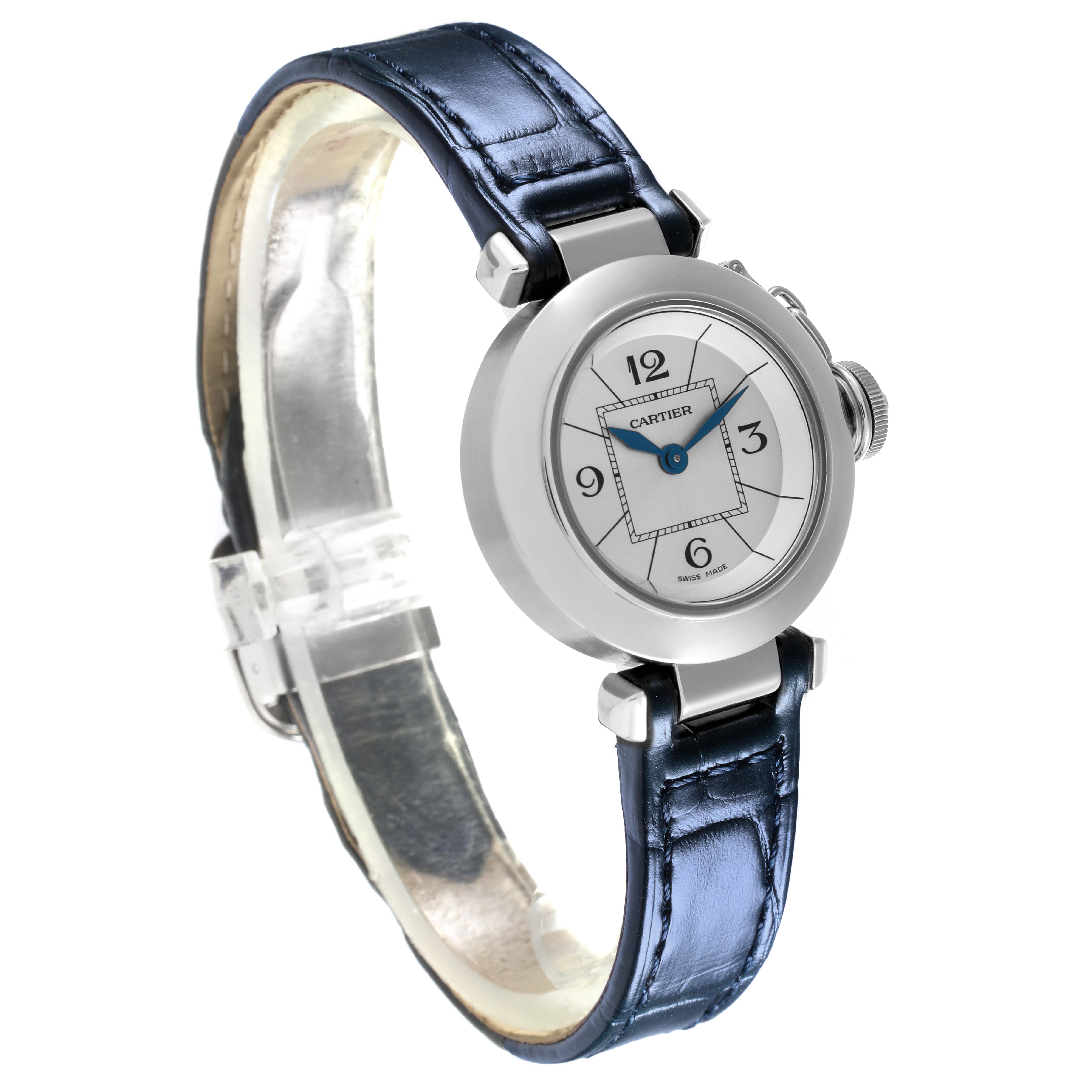 The Cartier Pasha W3140025 Women
s Stainless Steel Silver Dial W3140025 Women
s Stainless Steel Silver Dial watch is shown from a side angle, highlighting the round case, crown, and blue leather strap.