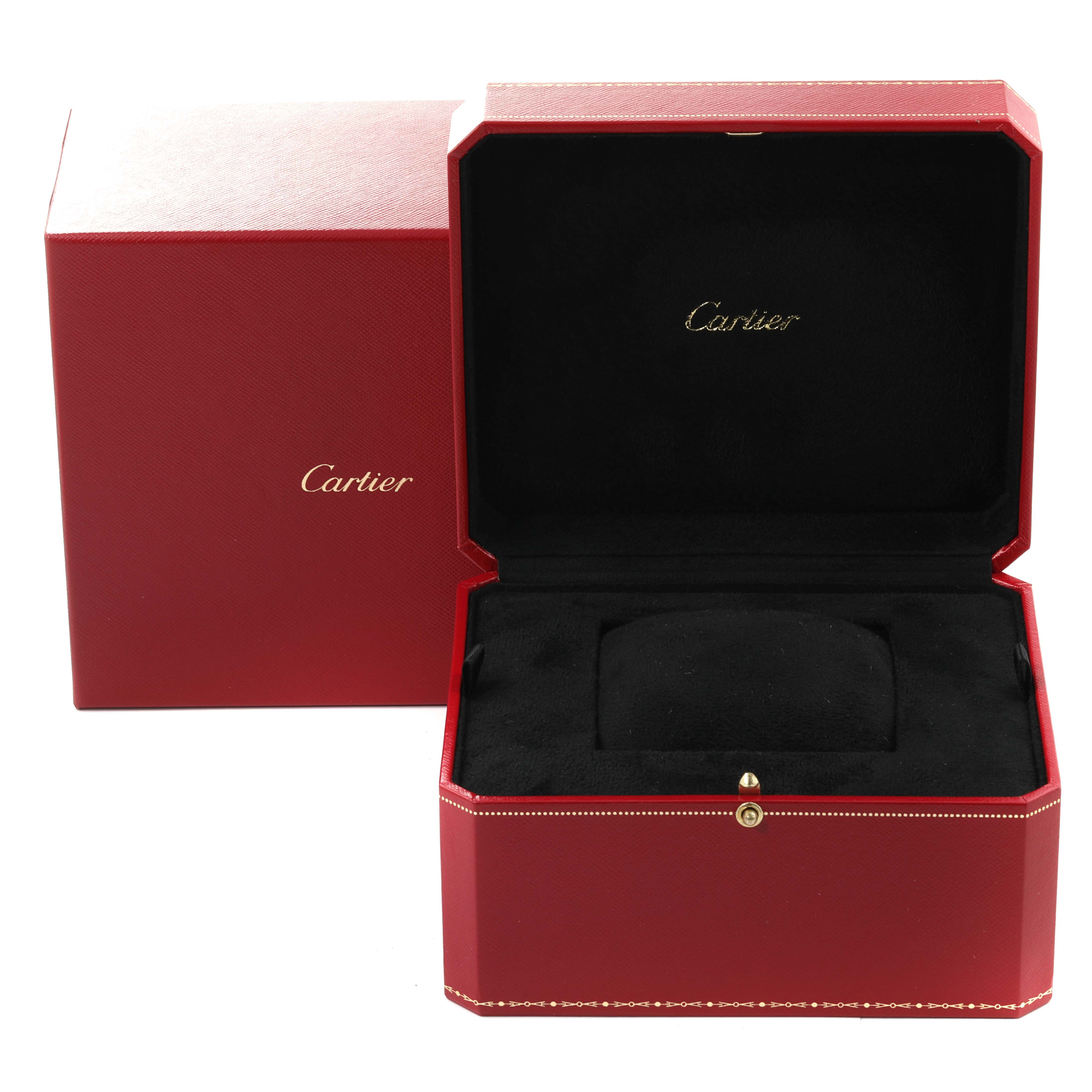 The image shows a Cartier Ronde WR007001 Men
s Rose Gold Silver Dial WR007001 Men
s Rose Gold Silver Dial watch box, featuring a red exterior and black interior with gold Cartier branding.
