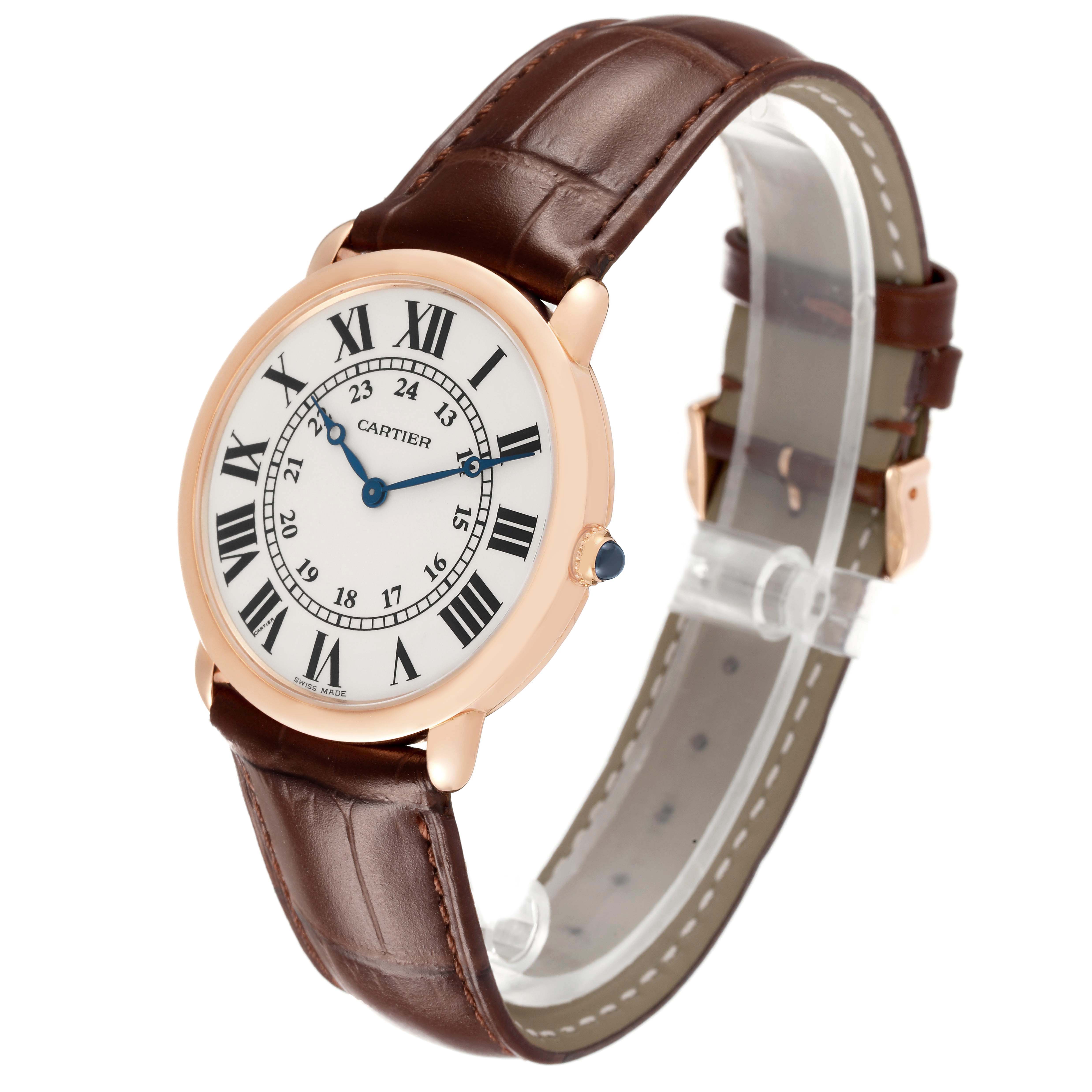 The Cartier Ronde W6800251 Men's Rose Gold Silver Dial watch is shown at a three-quarter angle, highlighting its face, leather strap, and round case.