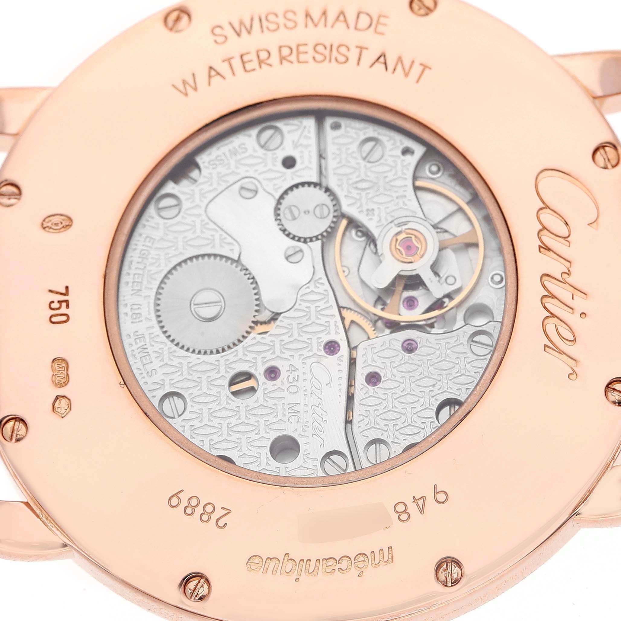 The image shows the back view of the Cartier Ronde W6800251 Men's Rose Gold Silver Dial watch, revealing its mechanical movement.