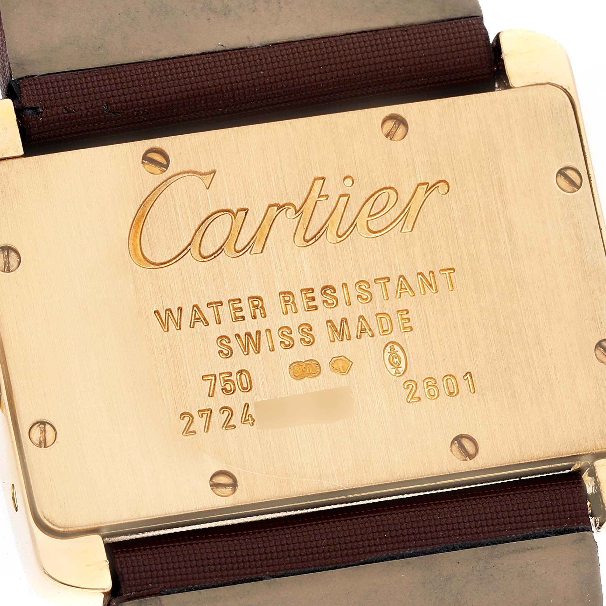 The image shows the back case of a Cartier Tank Divan WA301071 Women
s Yellow Gold Silver Dial WA301071 Women
s Yellow Gold Silver Dial watch, highlighting its inscriptions and strap attachments.