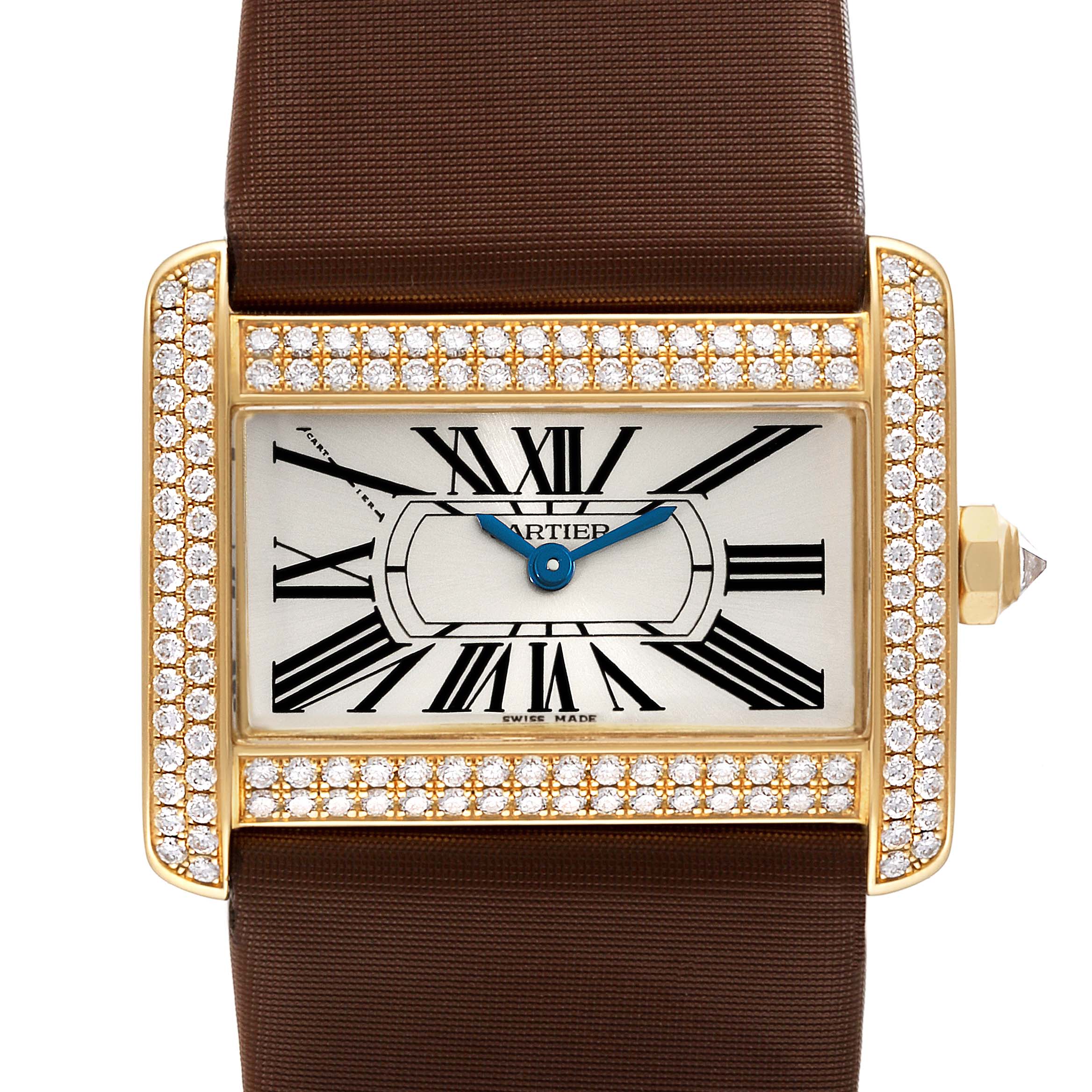 The image shows a front view of a Cartier Tank Divan WA301071 Women
s Yellow Gold Silver Dial WA301071 Women
s Yellow Gold Silver Dial watch, showcasing its rectangular face, blue hands, and diamond-encrusted bezel.