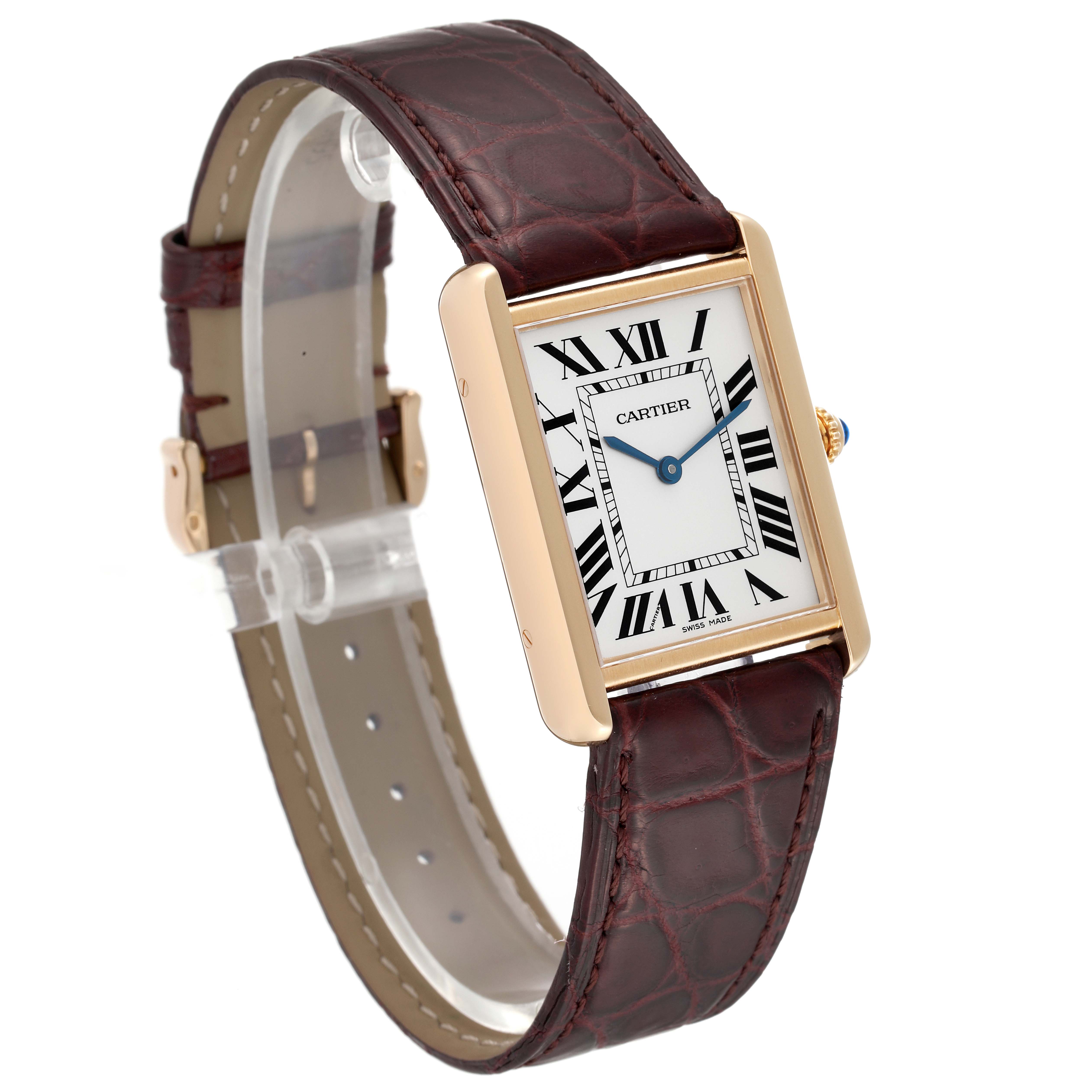 The image showcases a Cartier Tank Solo W1018855 Men
s Steel and Gold (two tone) Silver Dial W1018855 Men
s Steel and Gold (two tone) Silver Dial watch from an oblique angle, highlighting its rectangular face, Roman numerals, and leather band.