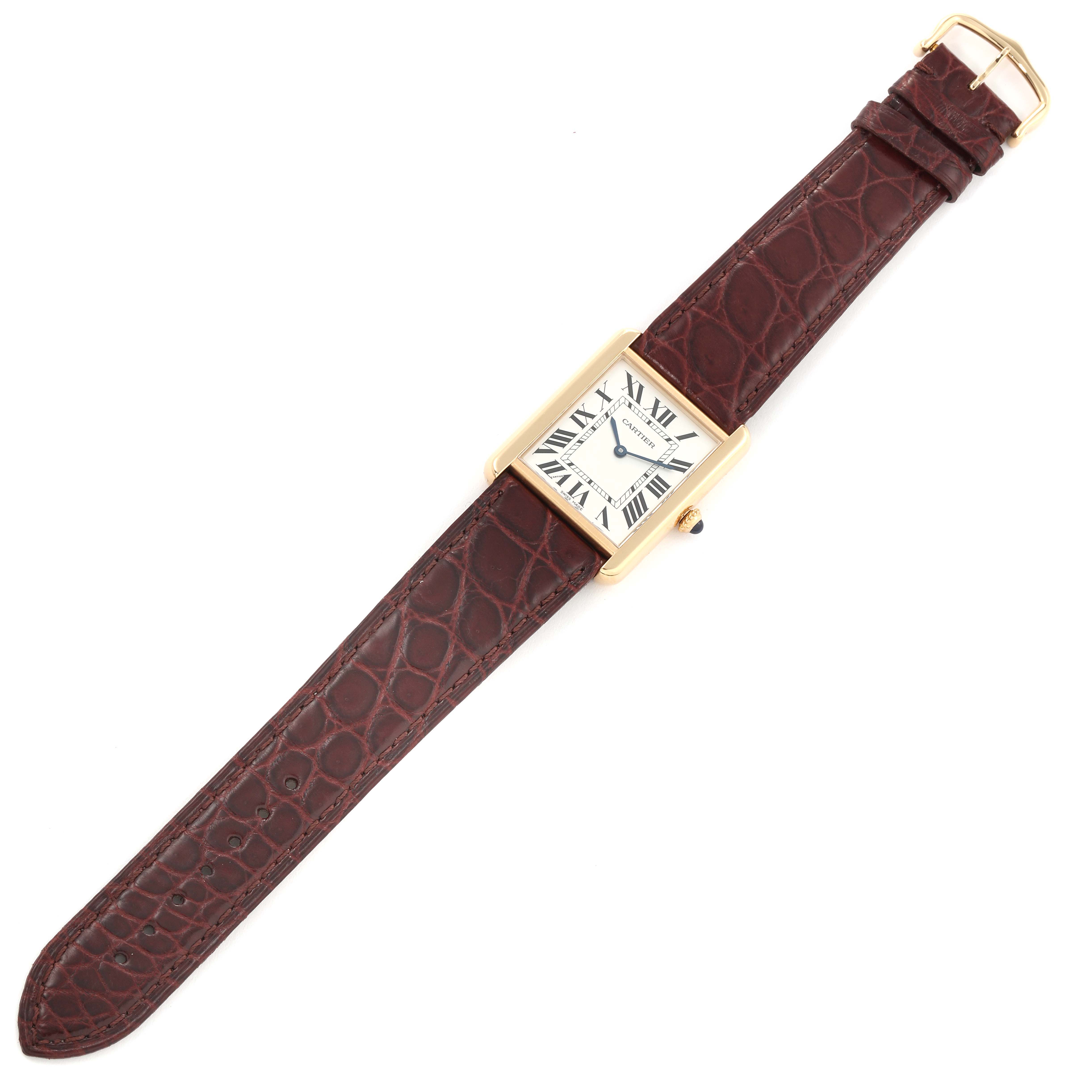 This image shows a Cartier Tank Solo W1018855 Men
s Steel and Gold (two tone) Silver Dial W1018855 Men
s Steel and Gold (two tone) Silver Dial watch, featuring a rectangular dial and a brown leather strap, viewed from the top.