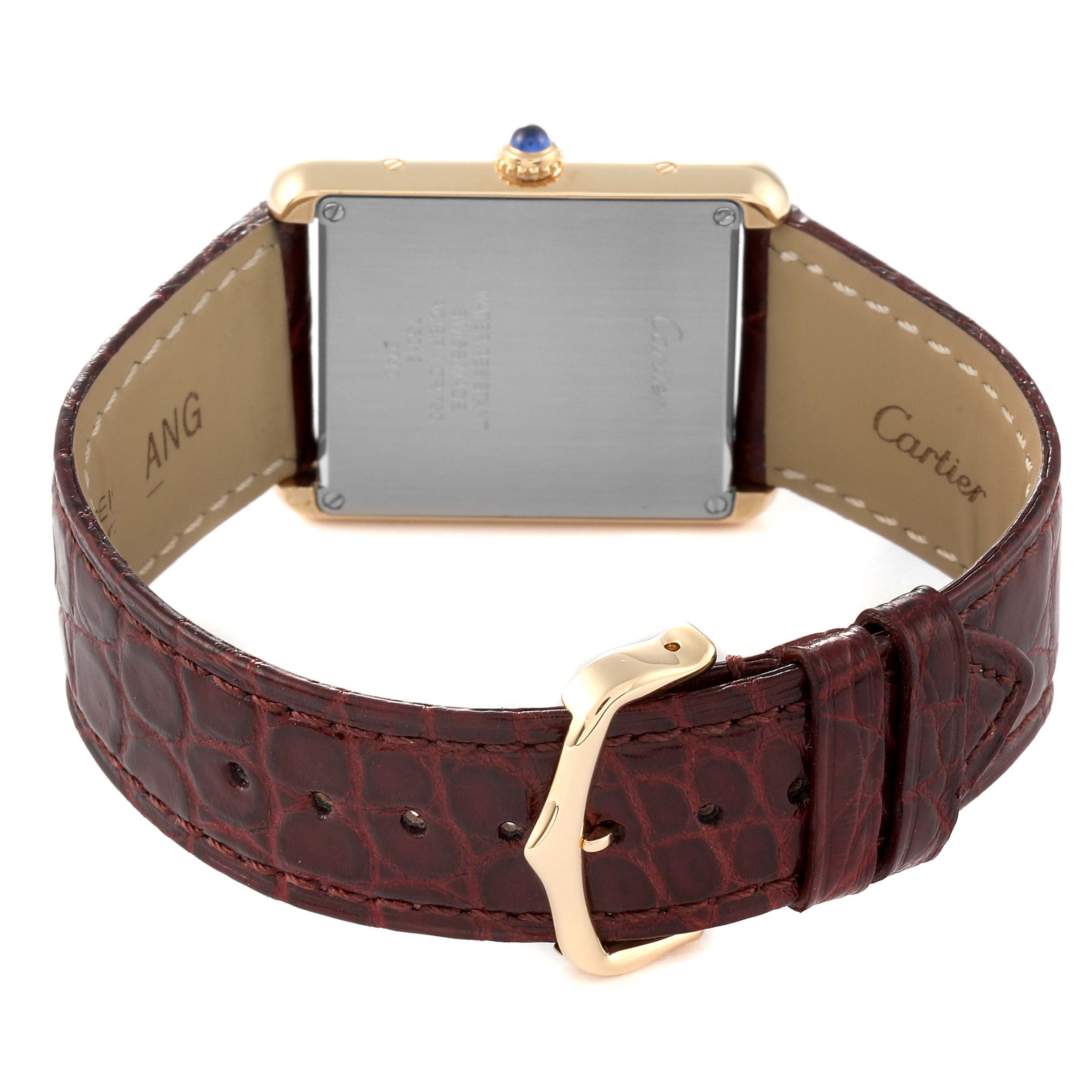 This image shows the back and strap of a Cartier Tank Solo W1018855 Men
s Steel and Gold (two tone) Silver Dial W1018855 Men
s Steel and Gold (two tone) Silver Dial watch, highlighting the rectangular case, crown, and brown leather strap with buckle.