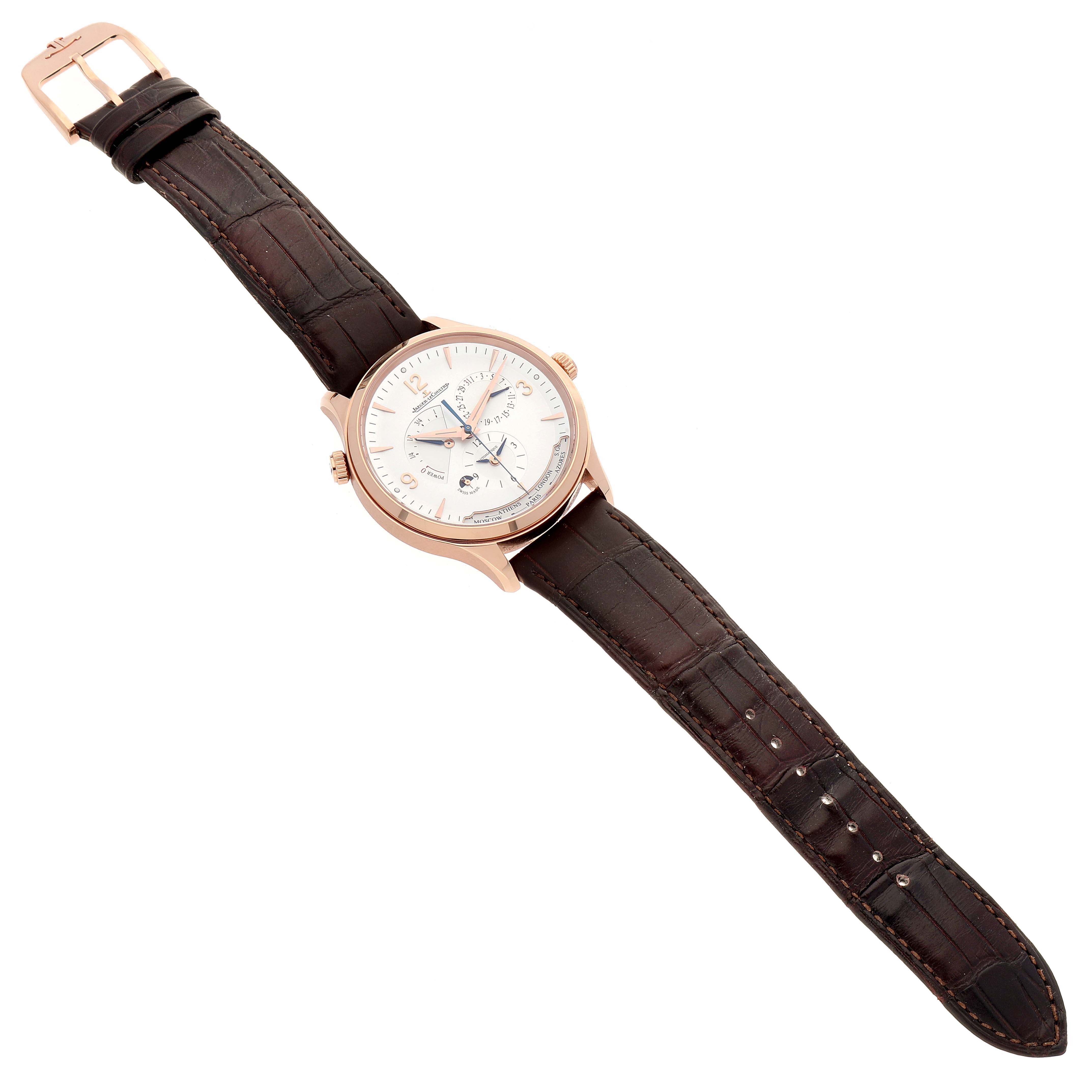 The Jaeger LeCoultre Master Q4122520 Men's Rose Gold Silver Dial Q4122520 Men's Rose Gold Silver Dial model watch is displayed flat, showcasing its dial, case, crown, and leather strap with buckle.