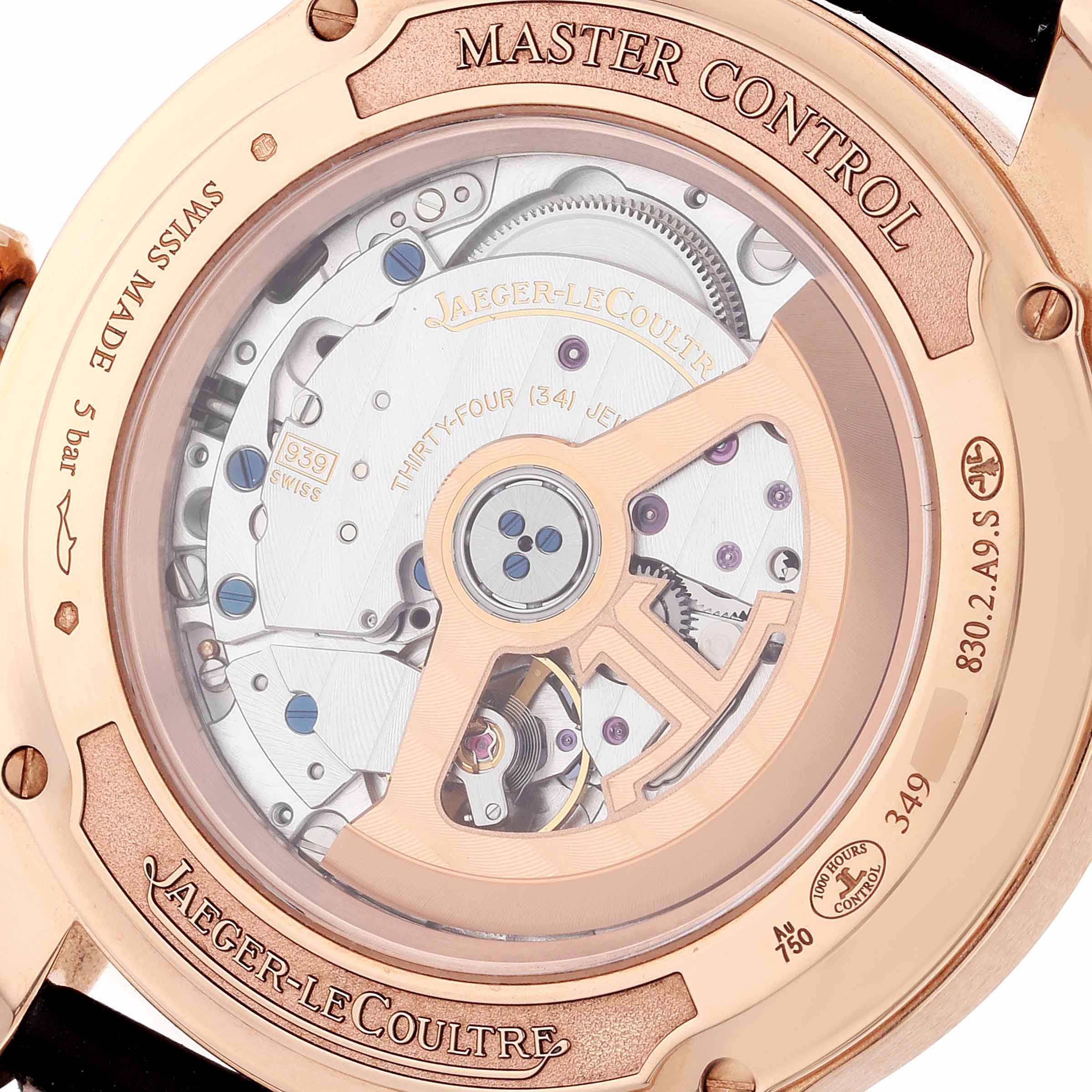 The image shows the back of a Jaeger-LeCoultre Master Control watch, showcasing the movement and internal mechanism.