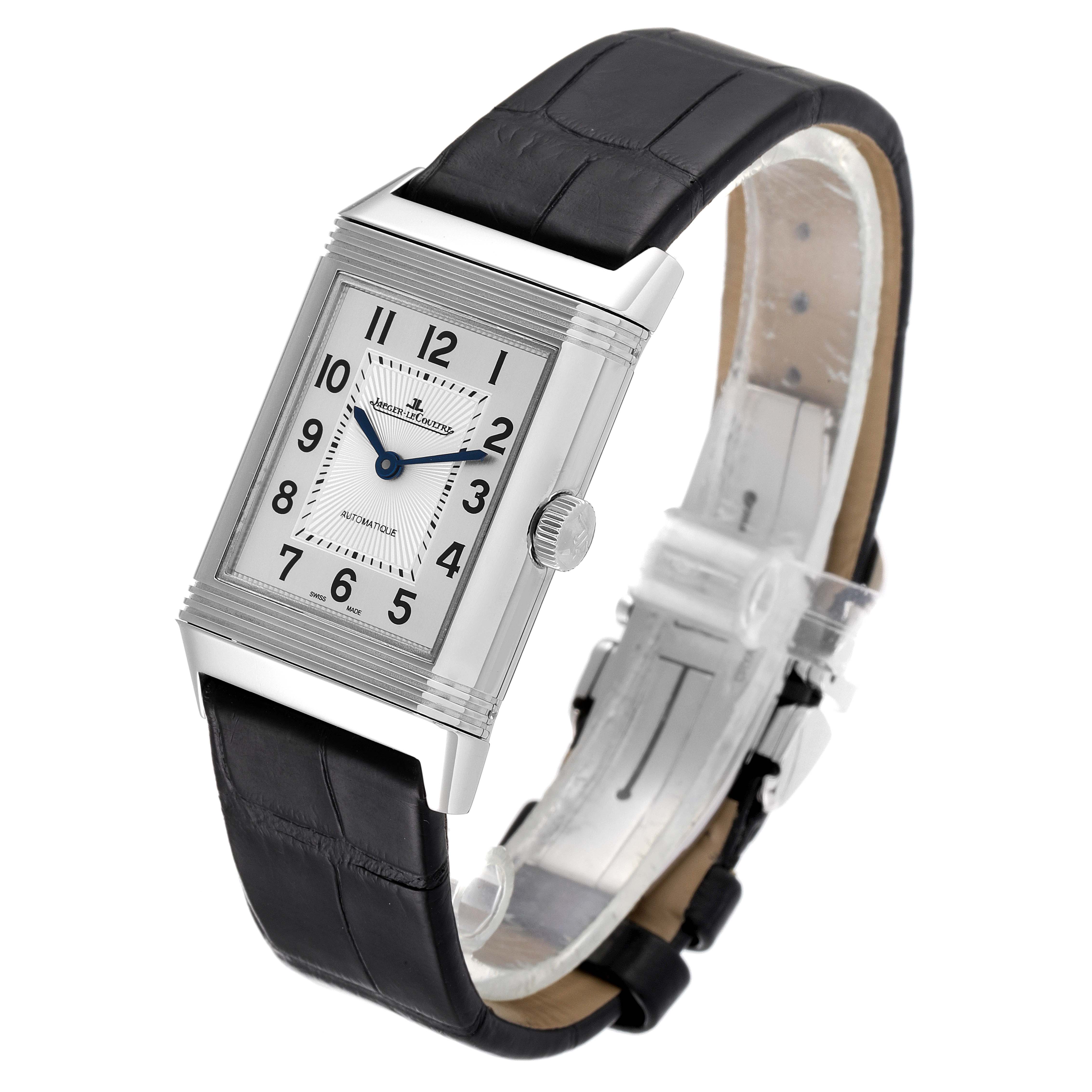 The photo shows a Jaeger LeCoultre Reverso Q2578420 Women's Stainless Steel Black Dial Q2578420 Women's Stainless Steel Black Dial watch at a slight angle, highlighting the rectangular dial, crown, and leather strap.