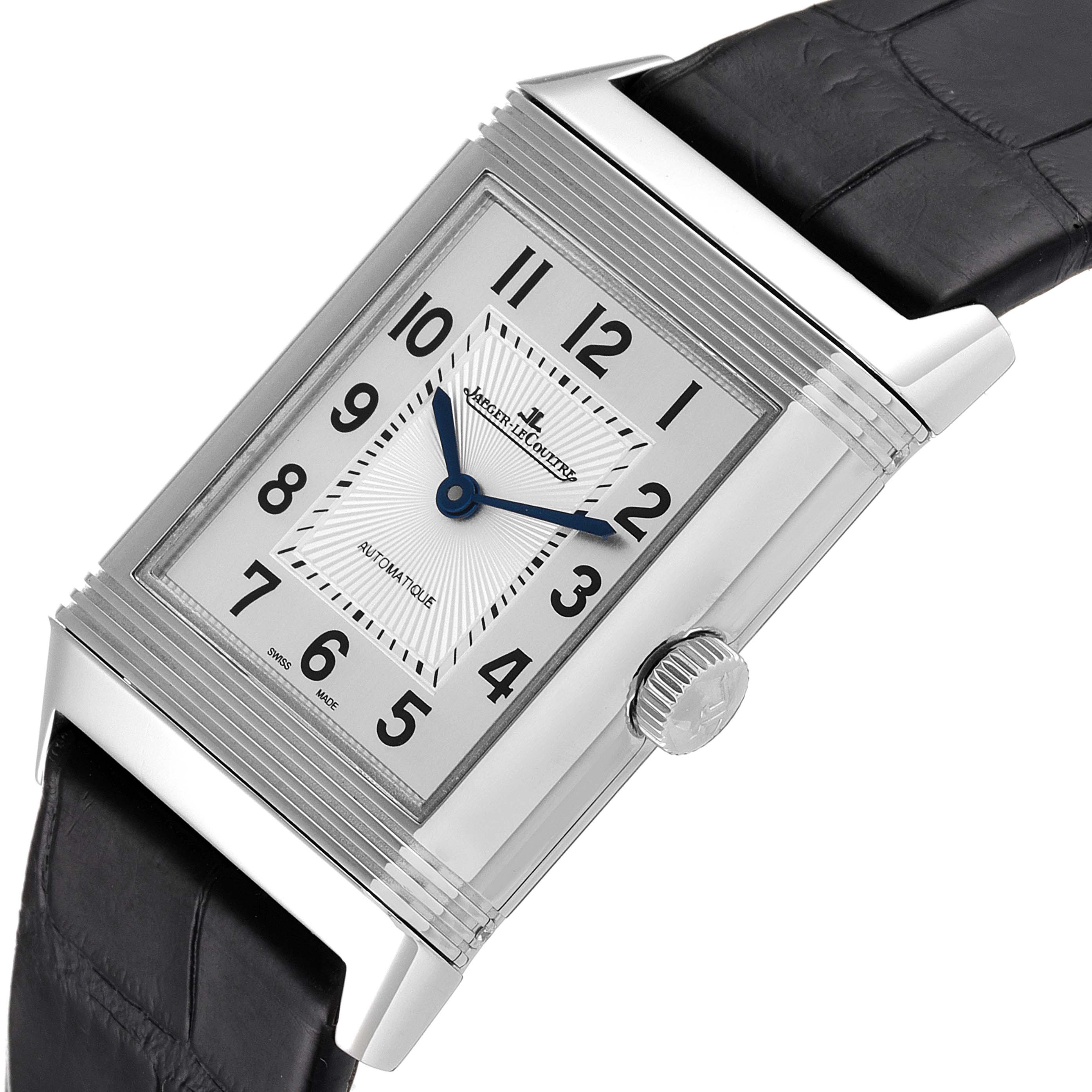The image shows a Jaeger-LeCoultre Reverso watch from a top and slight side angle, displaying the dial, casing, crown, and strap.