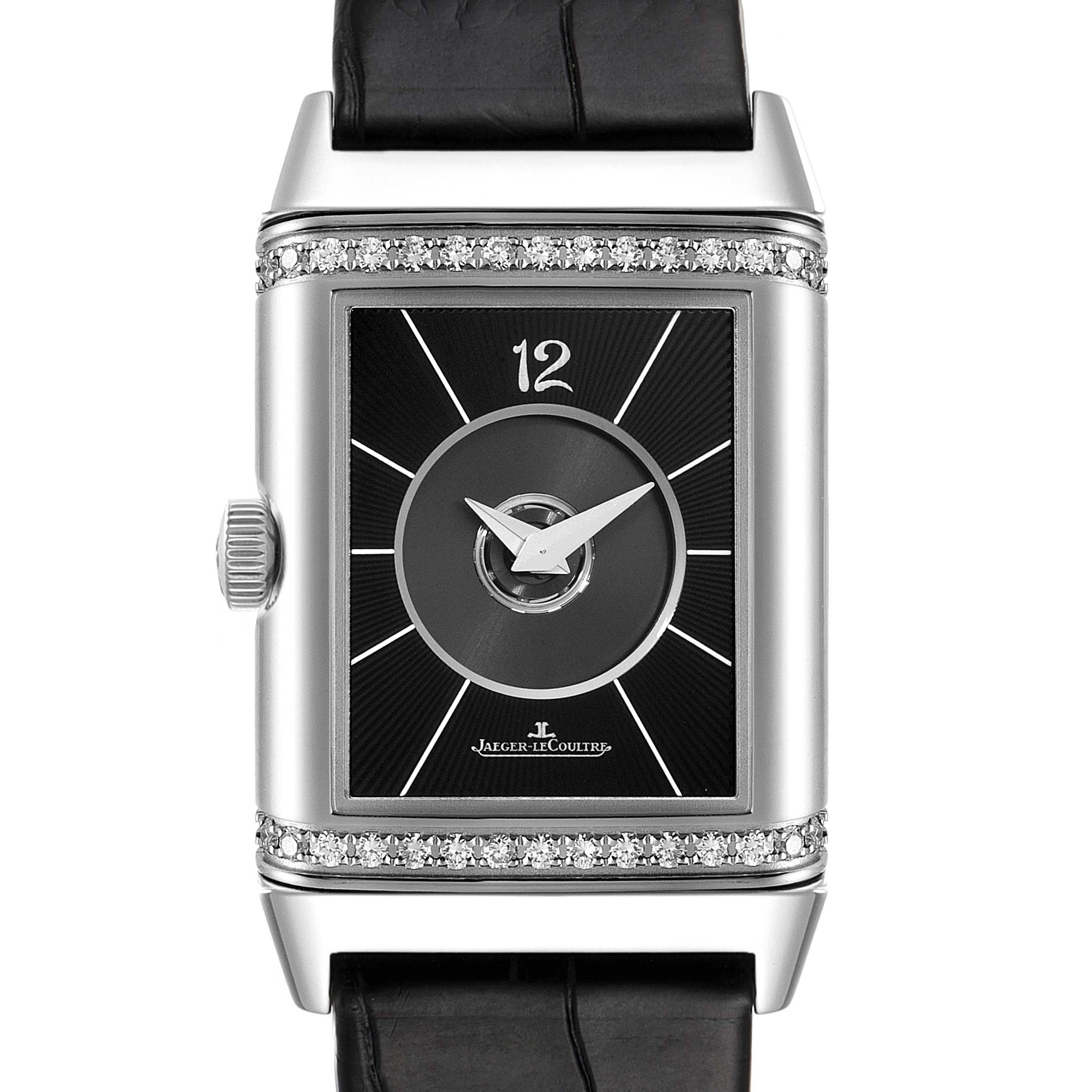 The image shows a front view of a Jaeger-LeCoultre Reverso watch, highlighting its rectangular face and strap.