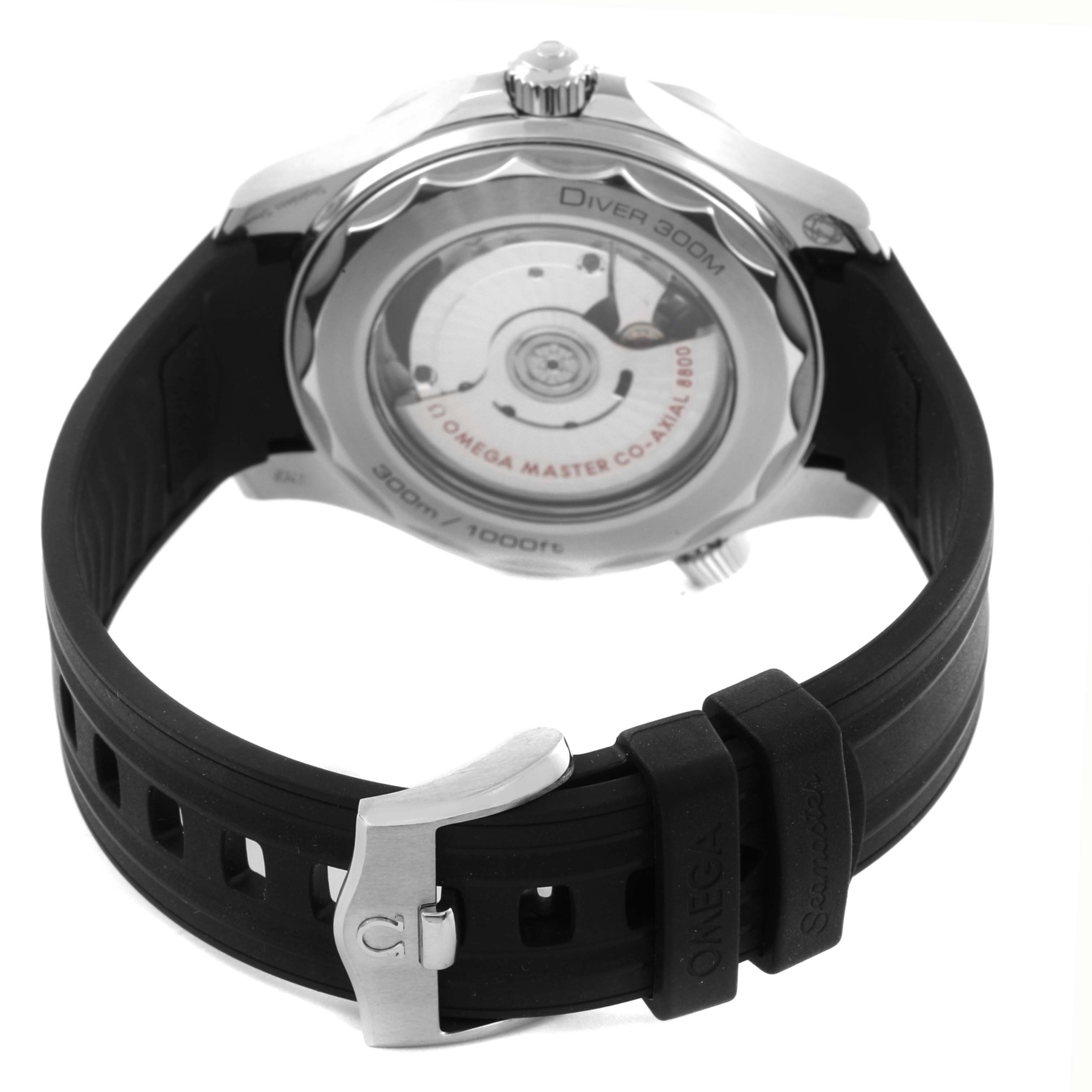 The Omega Seamaster 210.32.42.20.04.001 Men's Stainless Steel White Dial 210.32.42.20.04.001 Men's Stainless Steel White Dial watch is shown from the back, highlighting the strap, buckle, and transparent caseback.