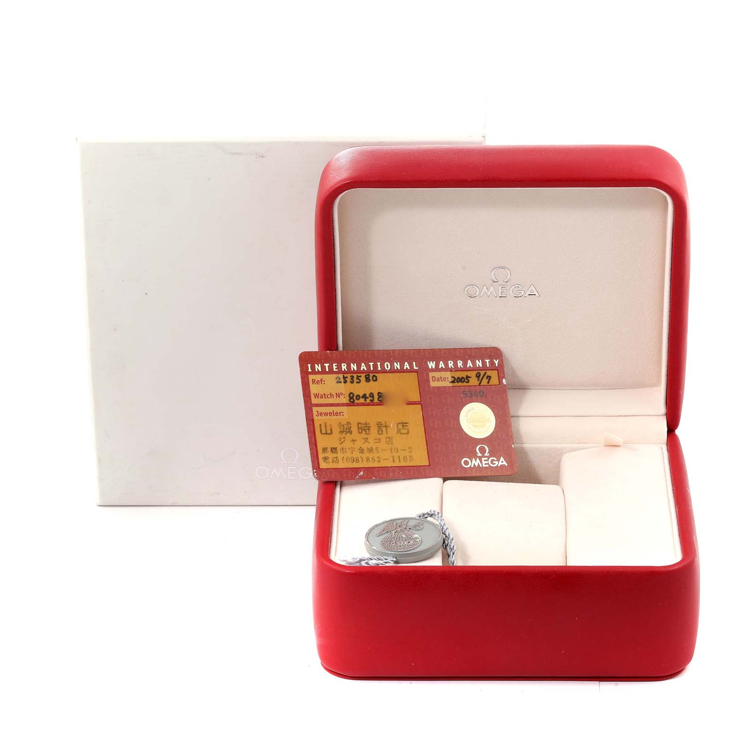 The image shows an Omega Seamaster 2535.80.00 Men's Stainless Steel Blue Dial 2535.80.00 Men's Stainless Steel Blue Dial watch box and an international warranty card inside the open box.