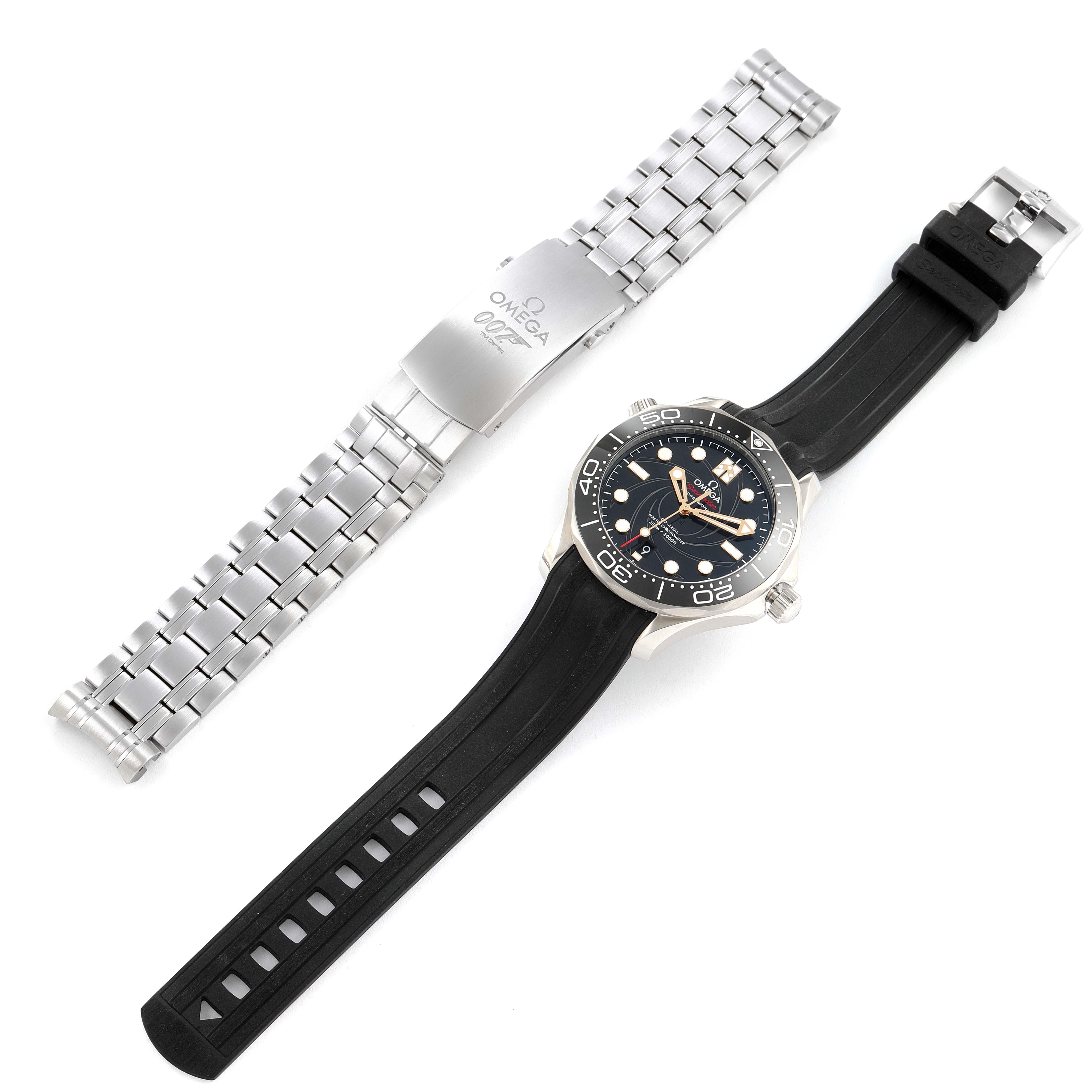 The image shows an Omega Seamaster 210.22.42.20.01.004 Men's Stainless Steel Black Dial 210.22.42.20.01.004 Men's Stainless Steel Black Dial watch with a black rubber strap, a detached metal bracelet, and is taken from a top-down angle.