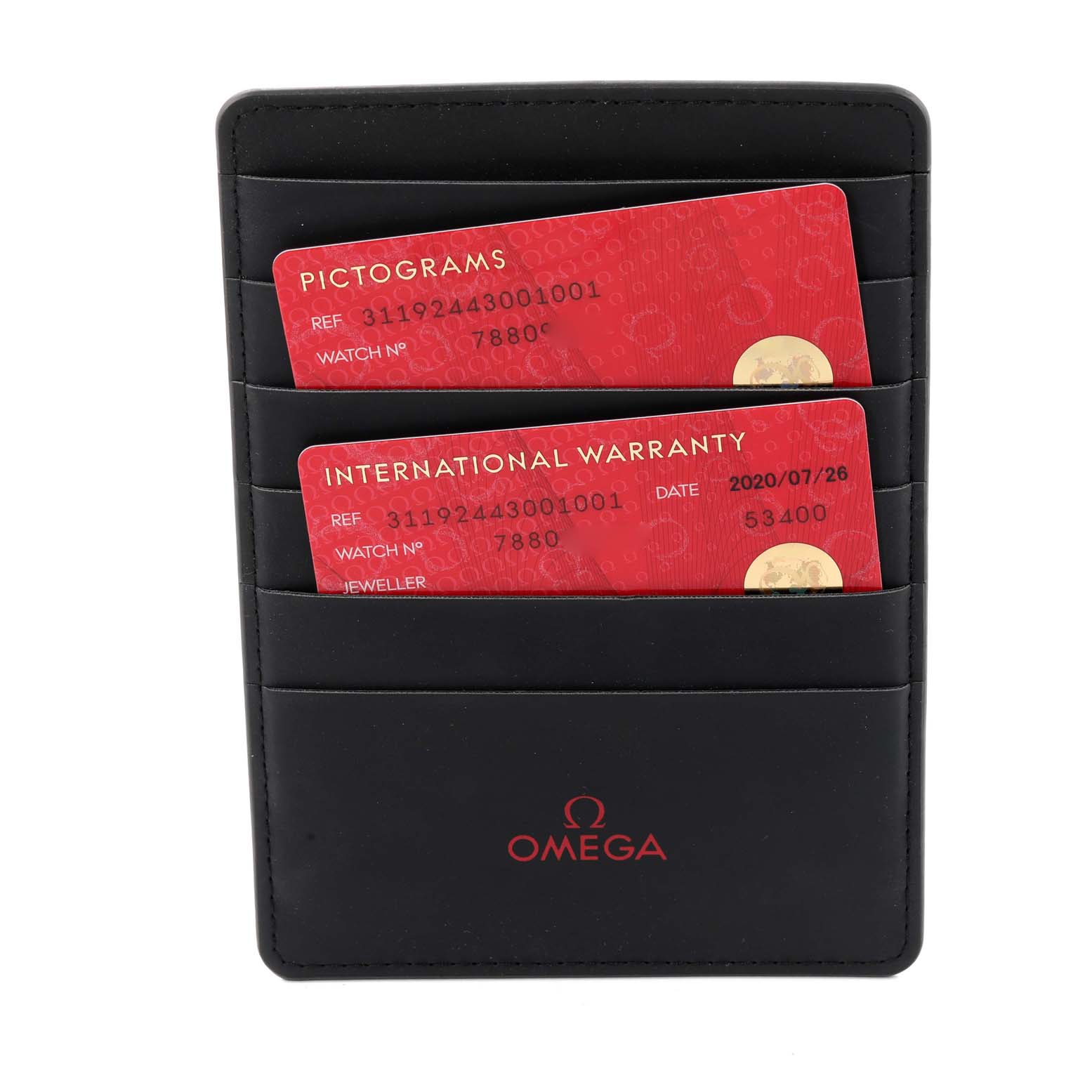 The image shows an Omega-branded cardholder containing the Pictograms and International Warranty cards for the Omega Speedmaster 311.92.44.30.01.001 Men's Ceramic Black Dial 311.92.44.30.01.001 Men's Ceramic Black Dial model.