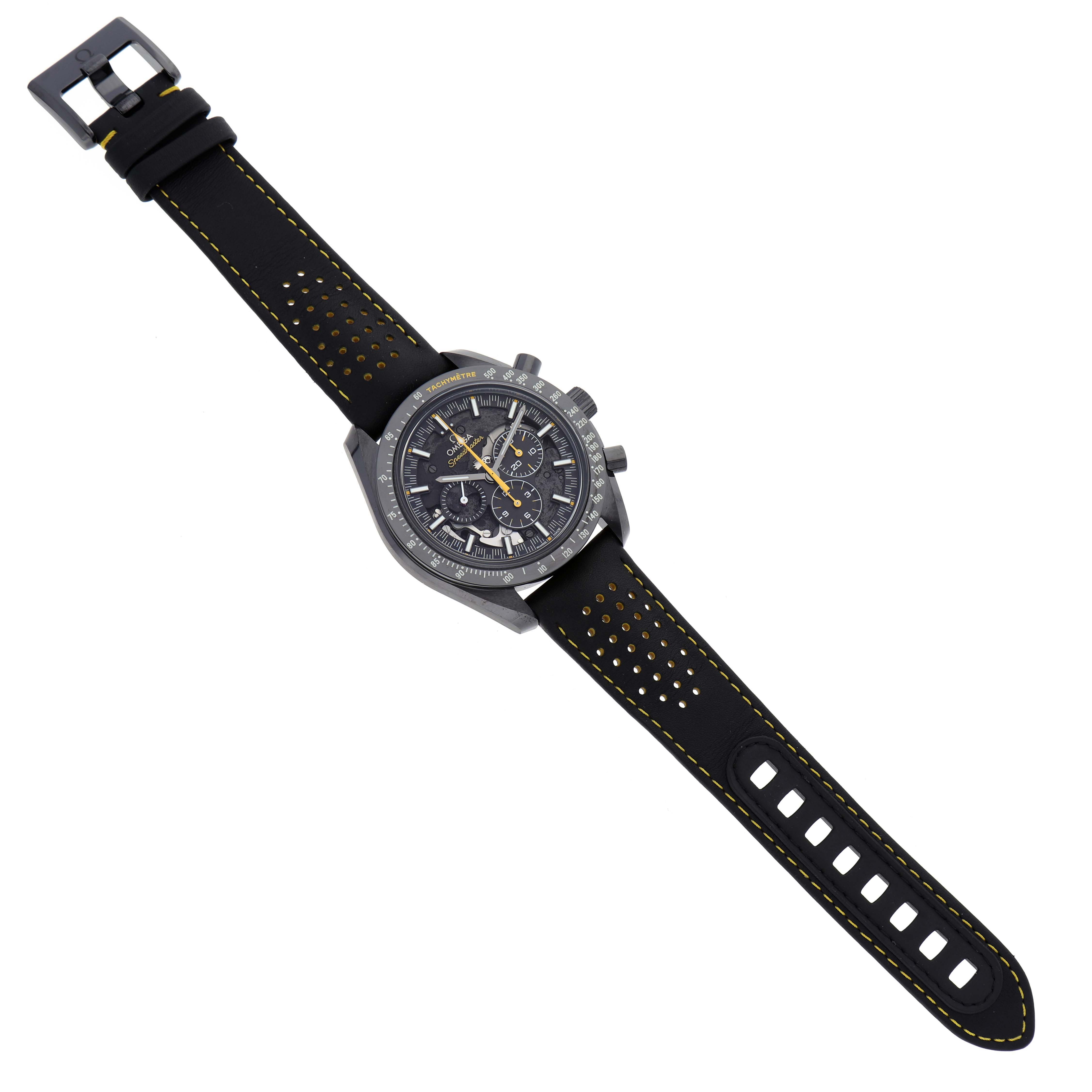 The image shows an Omega Speedmaster 311.92.44.30.01.001 Men's Ceramic Black Dial 311.92.44.30.01.001 Men's Ceramic Black Dial watch from a top-down angle, displaying its face, strap, and buckle.