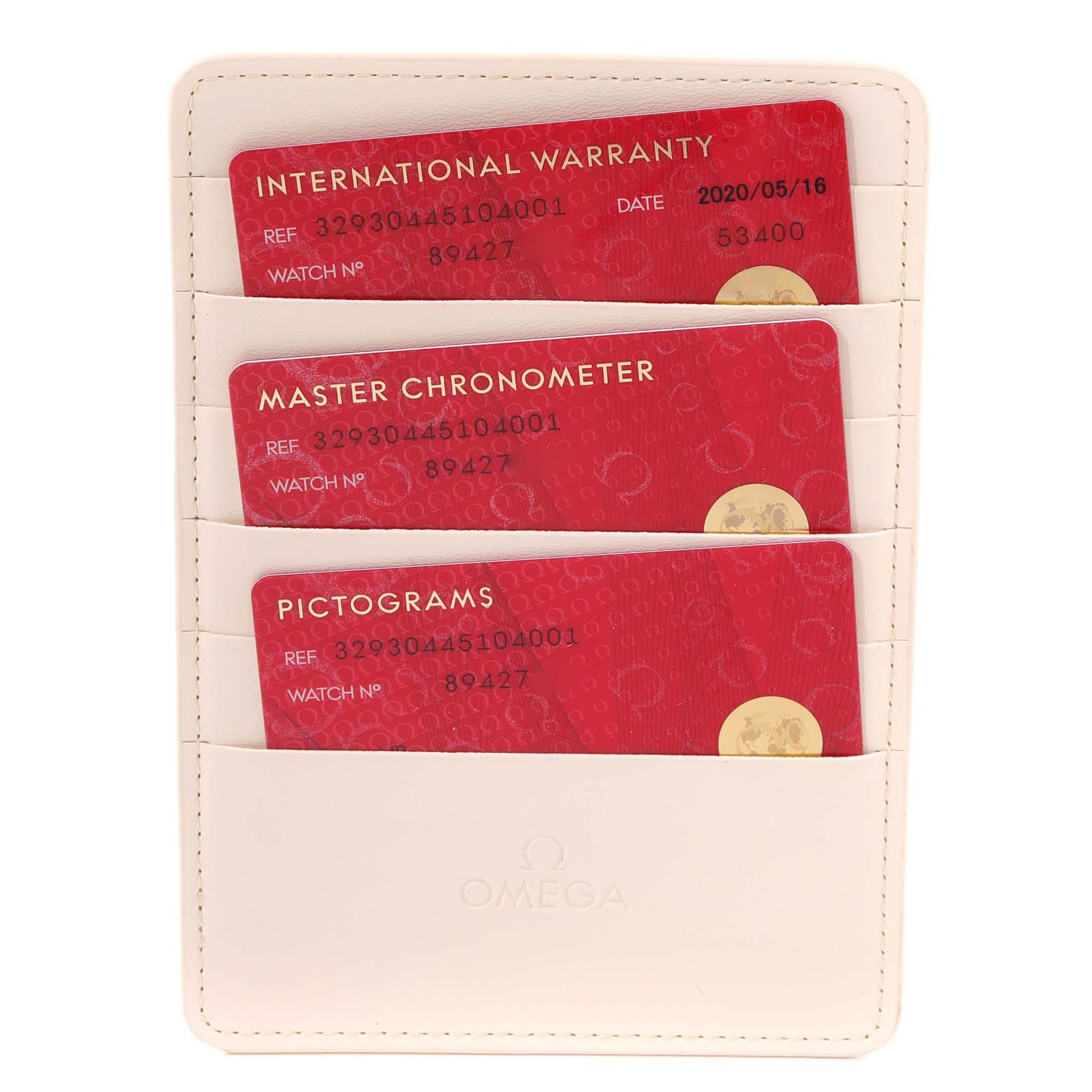 The image shows an Omega Speedmaster 329.30.44.51.04.001 Men
s Stainless Steel White Dial 329.30.44.51.04.001 Men
s Stainless Steel White Dial
s warranty cards and certifications in a cardholder.