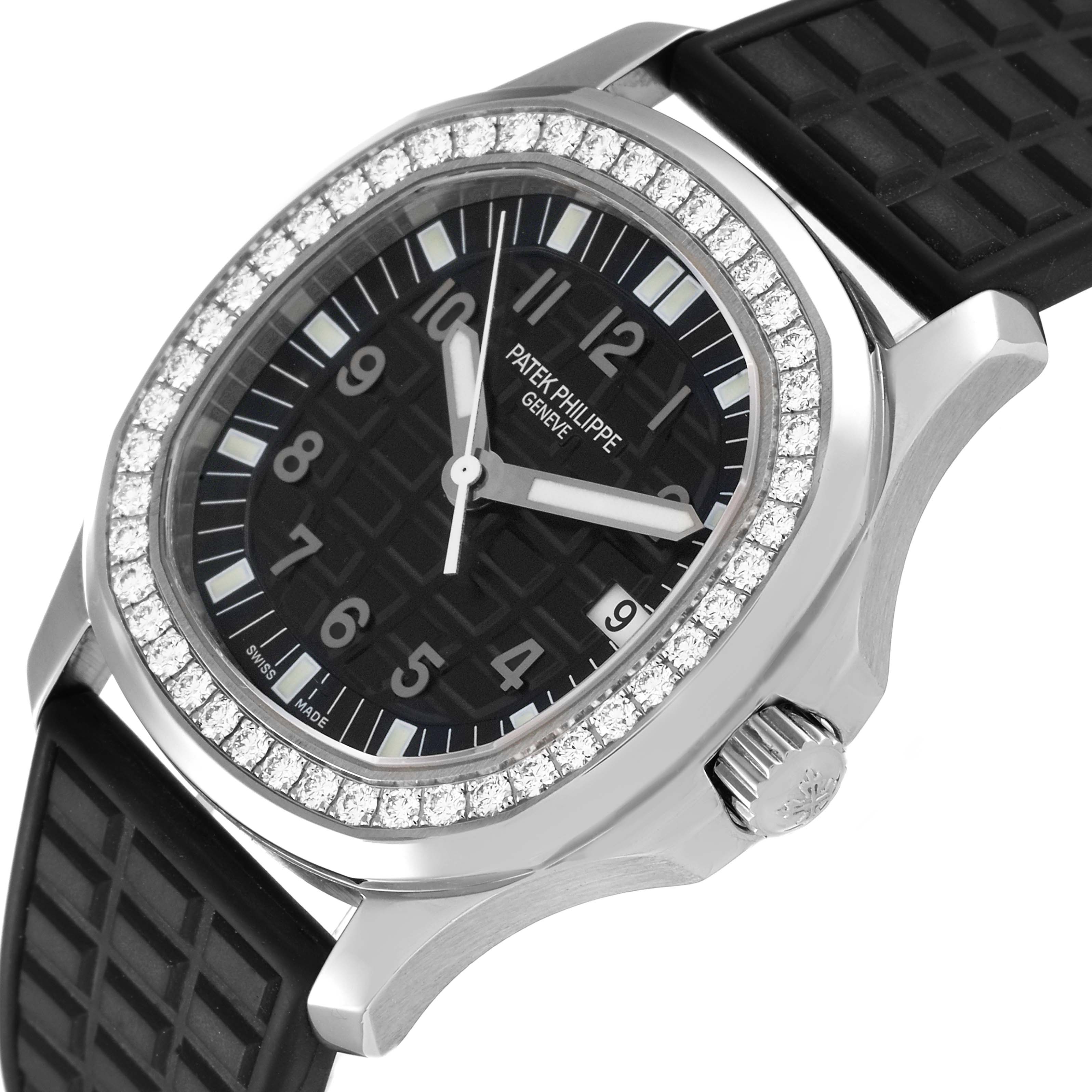 This is a close-up view of the Patek Philippe Aquanaut 5067 Women's Stainless Steel Black Dial 5067 Women's Stainless Steel Black Dial model, showing the dial, bezel, case, crown, and part of the rubber strap.