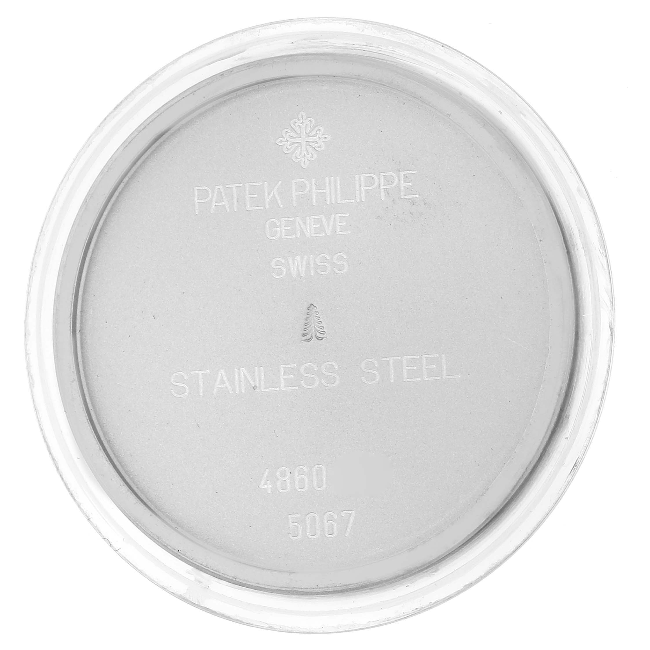 This image shows the stainless steel case back of a Patek Philippe Aquanaut 5067 Women's Stainless Steel Black Dial 5067 Women's Stainless Steel Black Dial watch, displaying the brand and model information.