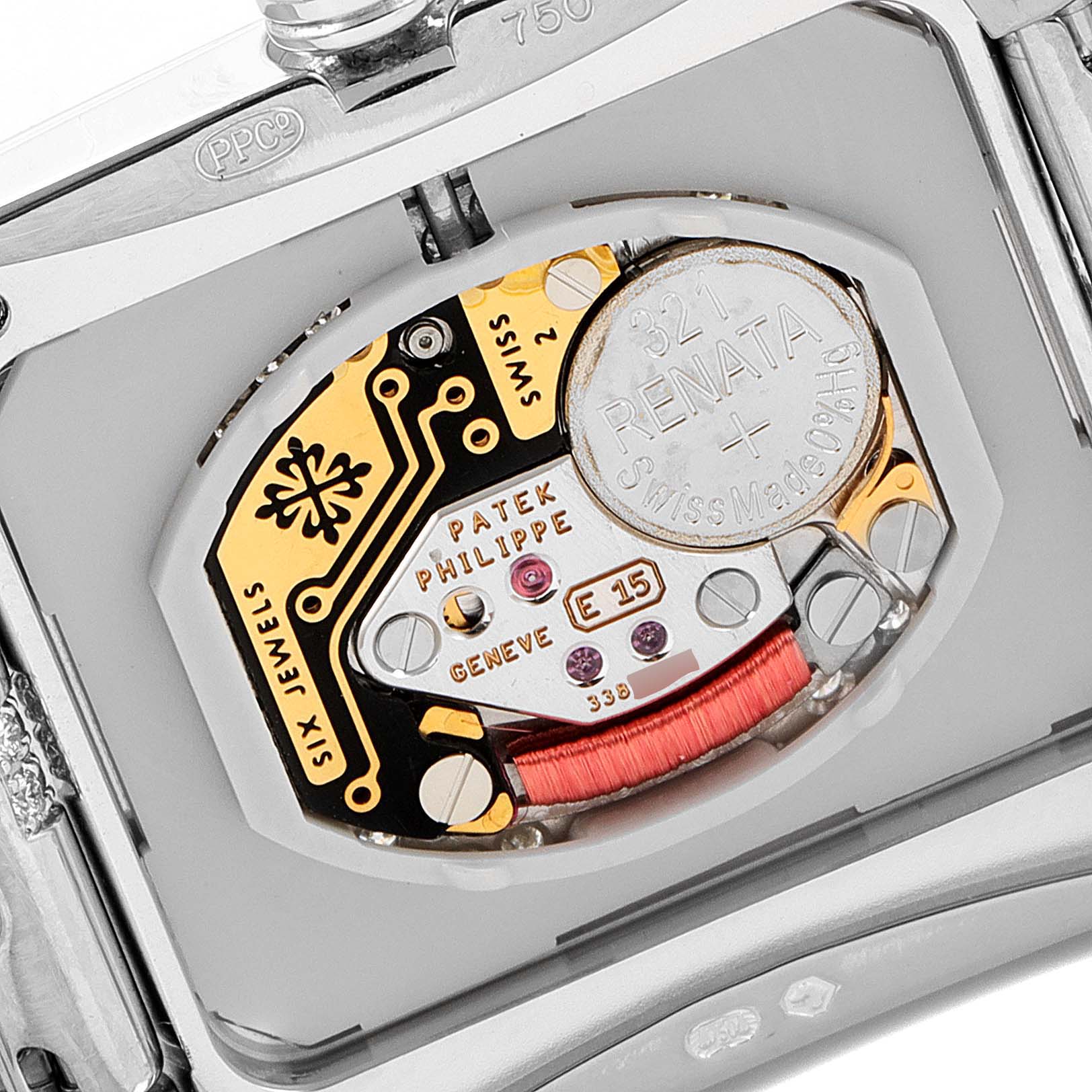 The image shows a close-up view of the movement and internal components of a Patek Philippe Twenty-4 4914G-001 Women's White Gold Mother of Pearl Dial 4914G-001 Women's White Gold Mother of Pearl Dial model watch.