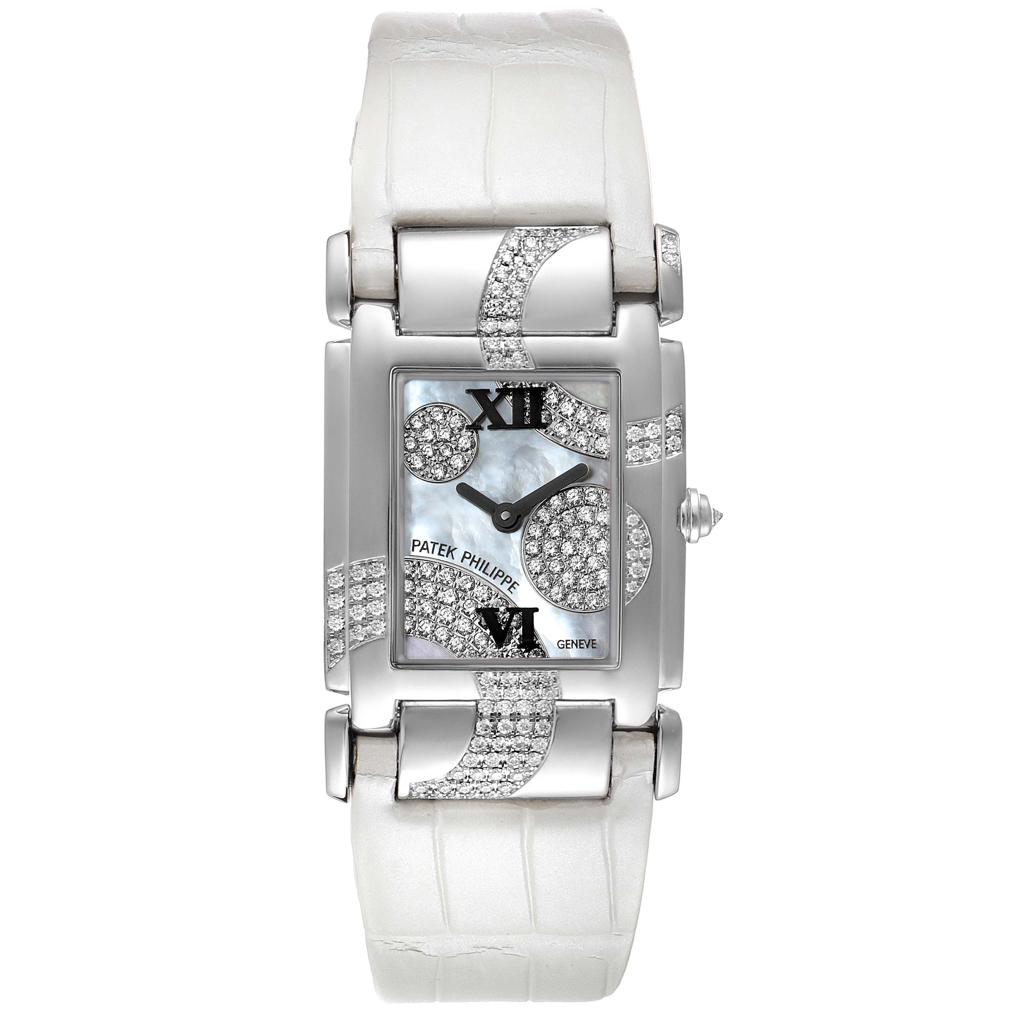 The image shows a Patek Philippe Twenty-4 4914G-001 Women's White Gold Mother of Pearl Dial 4914G-001 Women's White Gold Mother of Pearl Dial model watch from a top-down angle, displaying the watch face, strap, and diamond accents.