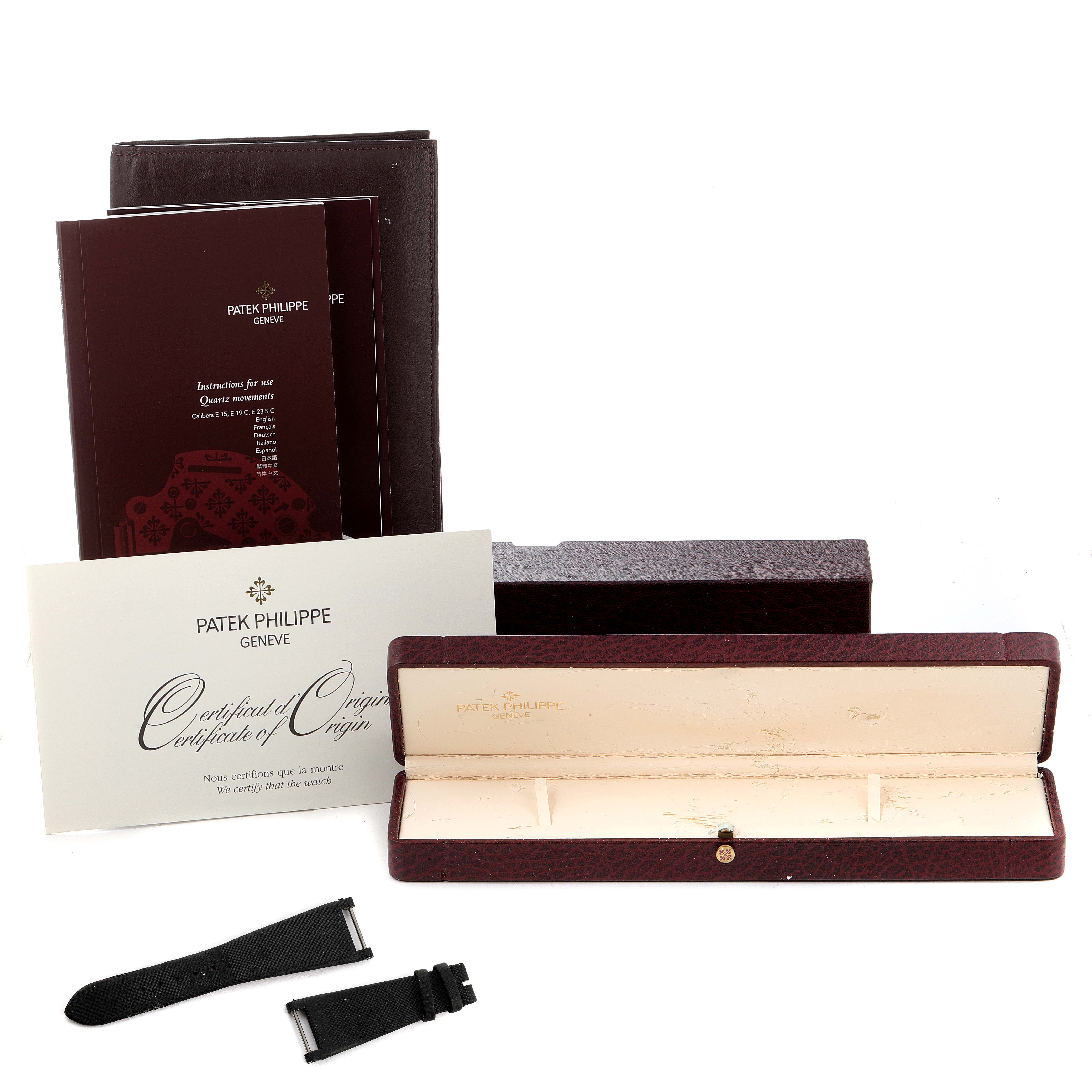 The image displays the packaging, documentation, and spare straps for a Patek Philippe Twenty-4 4914G-001 Women's White Gold Mother of Pearl Dial 4914G-001 Women's White Gold Mother of Pearl Dial model watch.