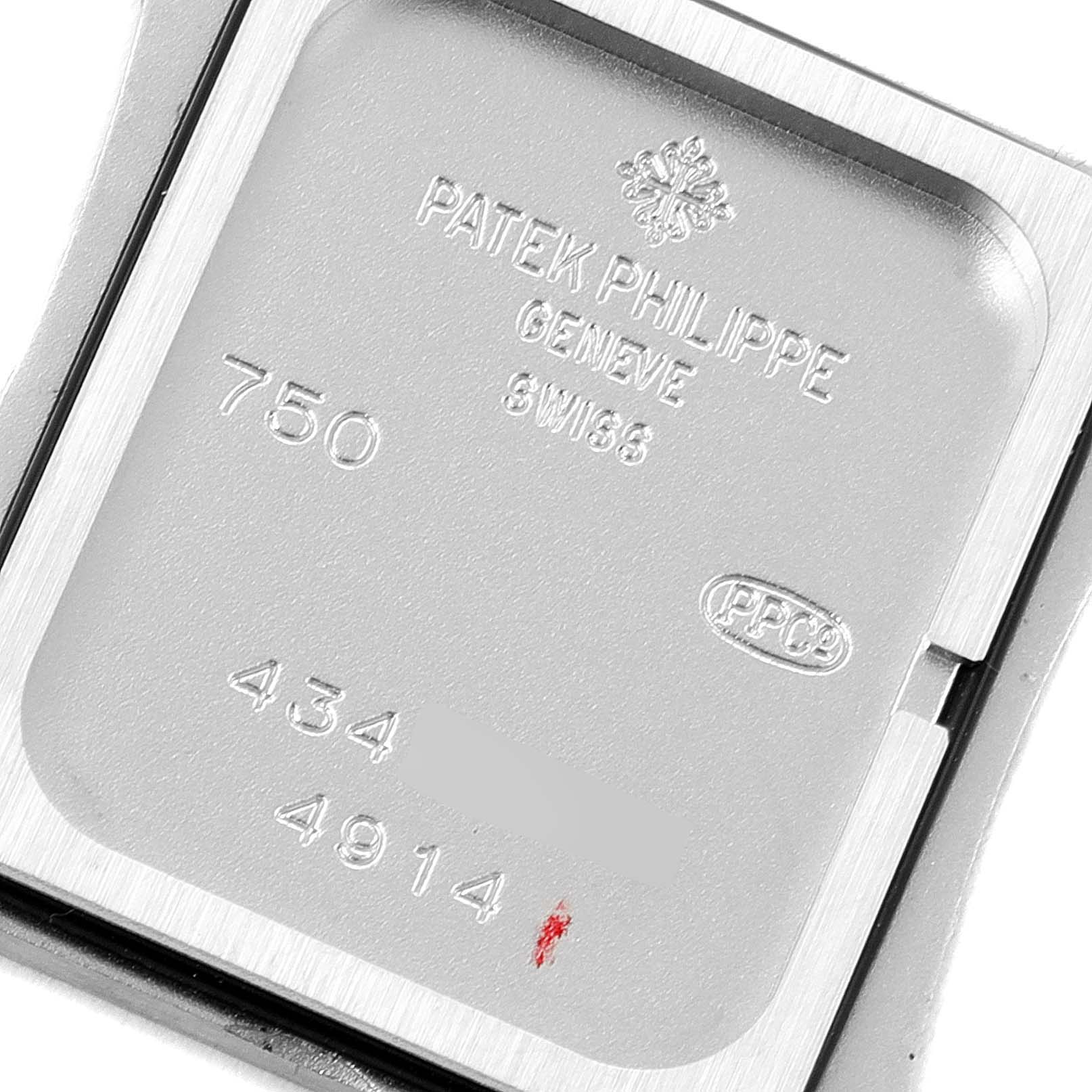 This image shows the case back of a Patek Philippe Twenty-4 4914G-001 Women's White Gold Mother of Pearl Dial 4914G-001 Women's White Gold Mother of Pearl Dial model, featuring the brand's engravings and serial numbers.