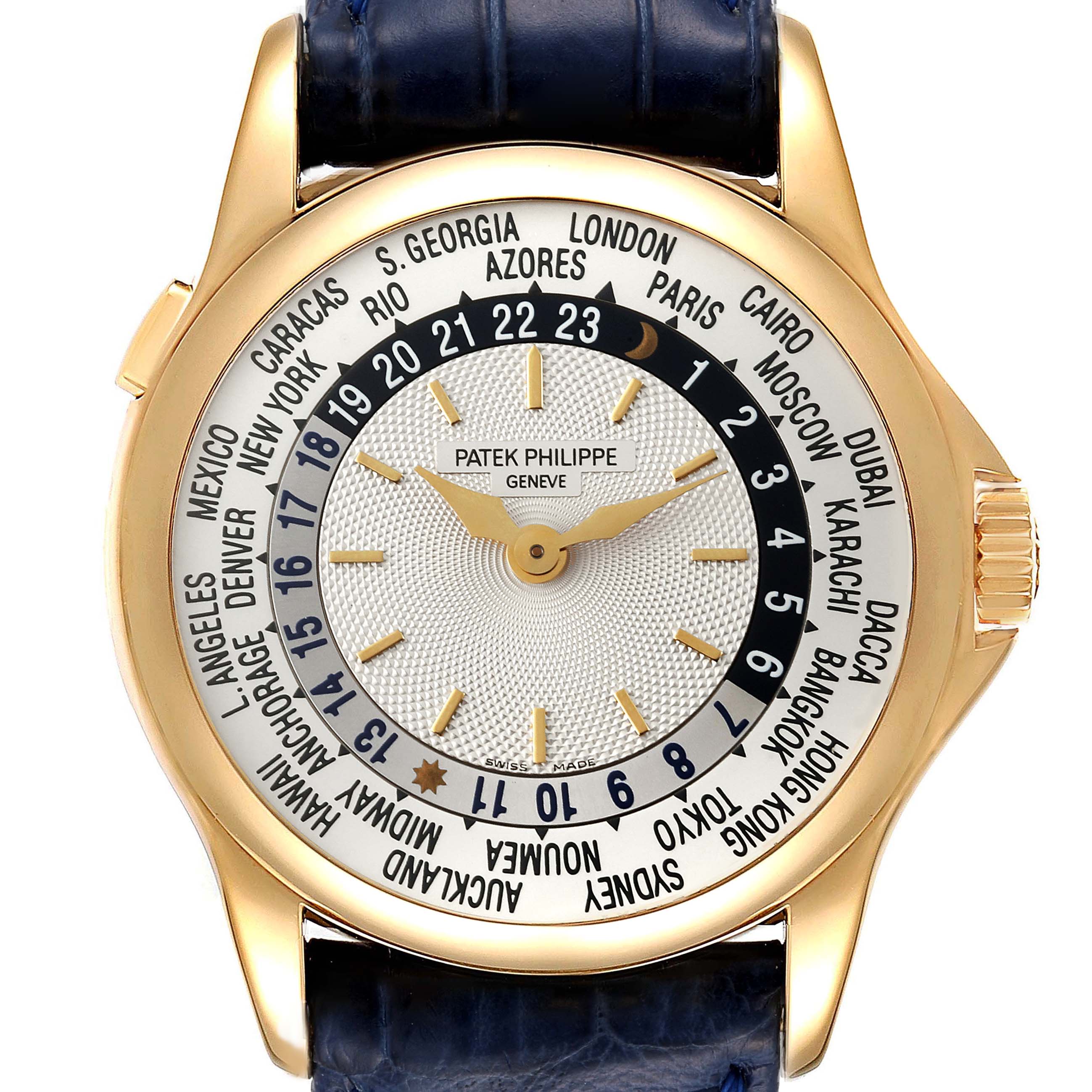 The image shows a front view of the Patek Philippe Complications 5110J Men's Yellow Gold Silver Dial 5110J Men's Yellow Gold Silver Dial model watch, highlighting the world time display and gold case.