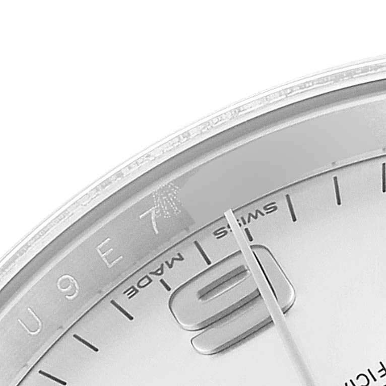 The image shows a close-up of the Rolex Air-King 114200 Men's Stainless Steel Silver Dial 114200 Men's Stainless Steel Silver Dial watch dial, focusing on the numerals, hands, and part of the bezel.