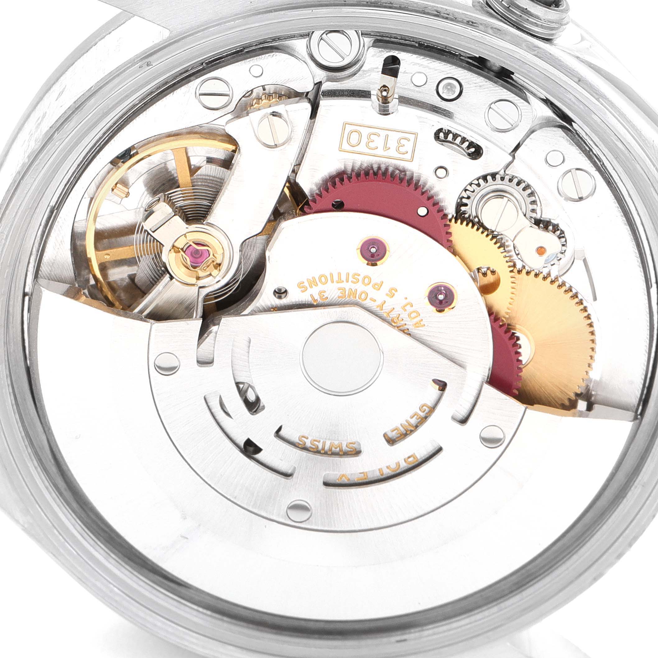 This is an image of the internal mechanism of the Rolex Air-King 14000 Men's Stainless Steel Silver Dial 14000 Men's Stainless Steel Silver Dial watch, displaying gears and the balance wheel.