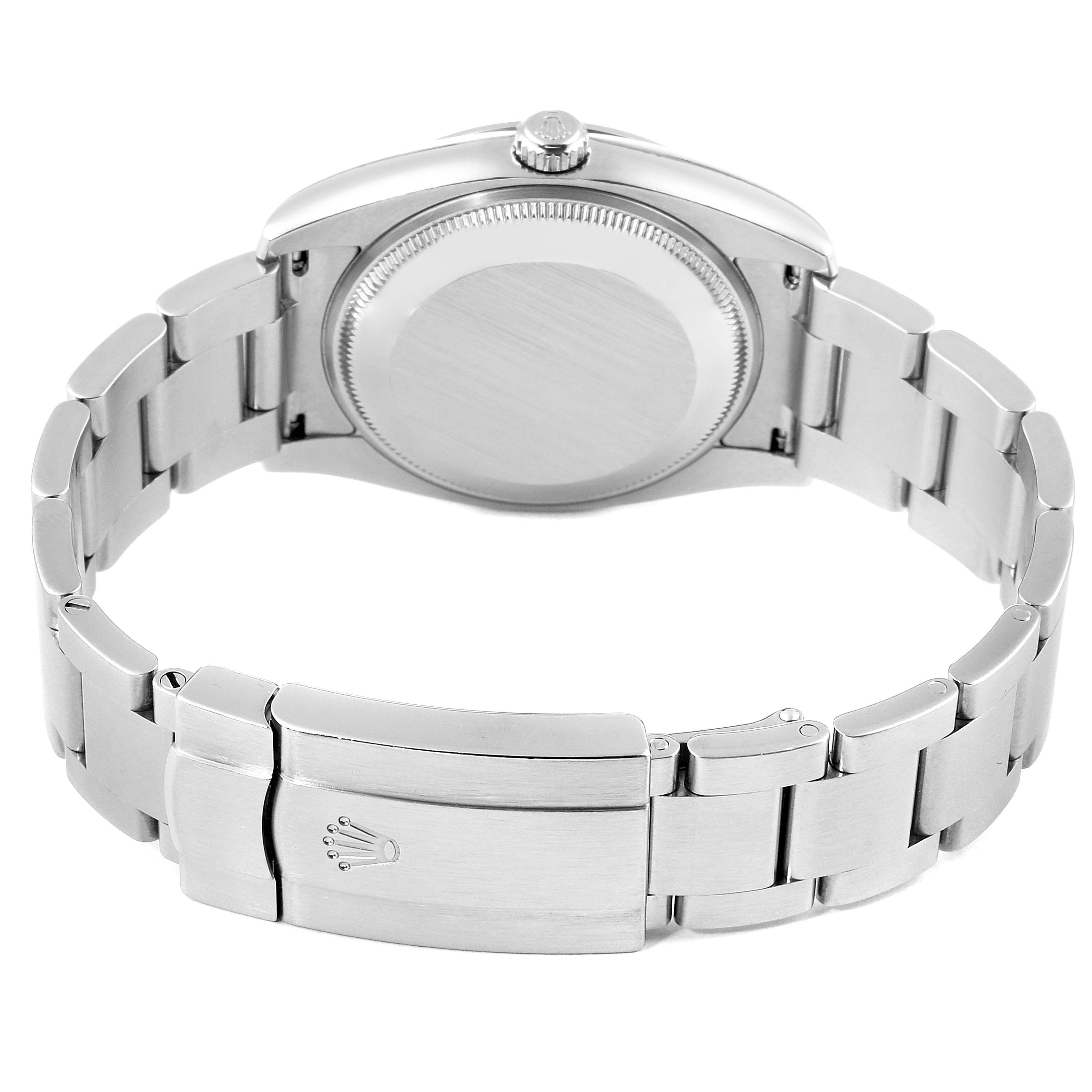 The image shows the back view of the Rolex Air-King 114200 Men's Stainless Steel Silver Dial 114200 Men's Stainless Steel Silver Dial watch, highlighting the case back, bracelet, and clasp with the Rolex logo.