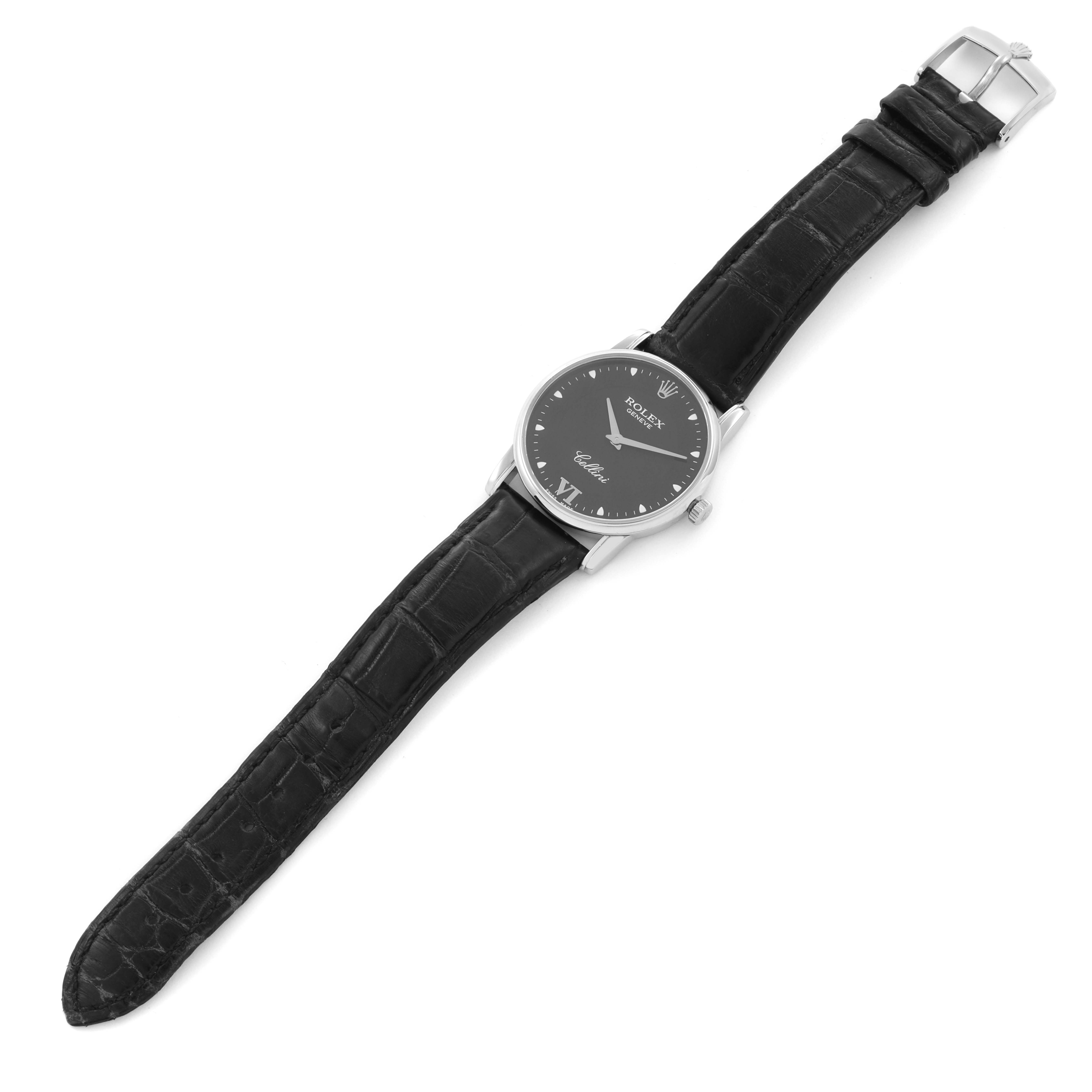 The Rolex Cellini 5116 Men's White Gold Black Dial 5116 Men's White Gold Black Dial watch is shown from a top-down angle, displaying the face, case, crown, and leather strap.