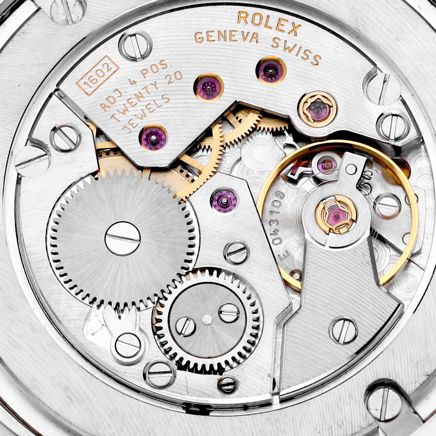 The image shows the intricate movement of a Rolex Cellini 5116 Men's White Gold Black Dial 5116 Men's White Gold Black Dial watch from a top-down angle, highlighting gears and jewels.