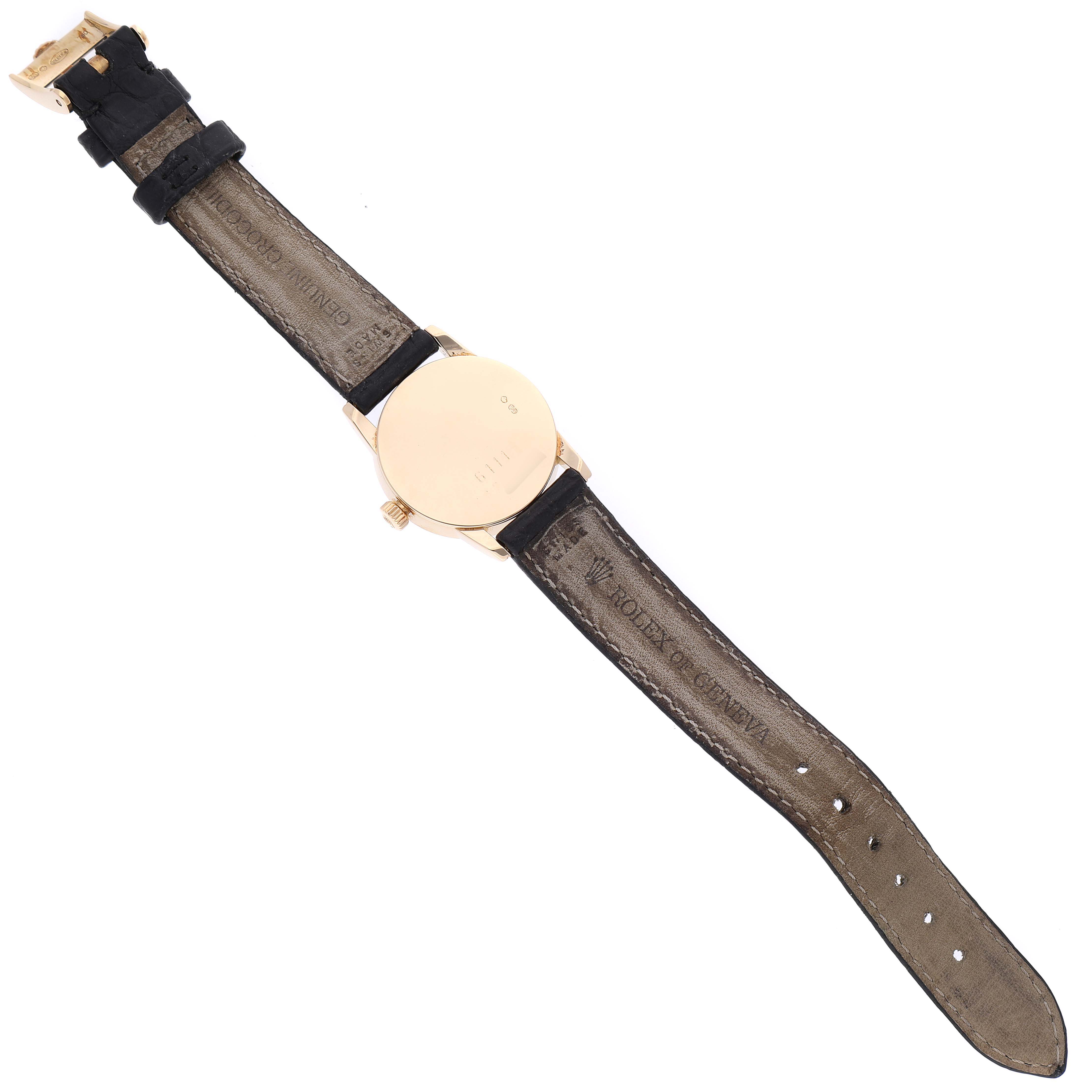 The image shows the back view of a Rolex Cellini 6111 Women's Yellow Gold Grey Dial 6111 Women's Yellow Gold Grey Dial model, displaying its leather strap and case back.