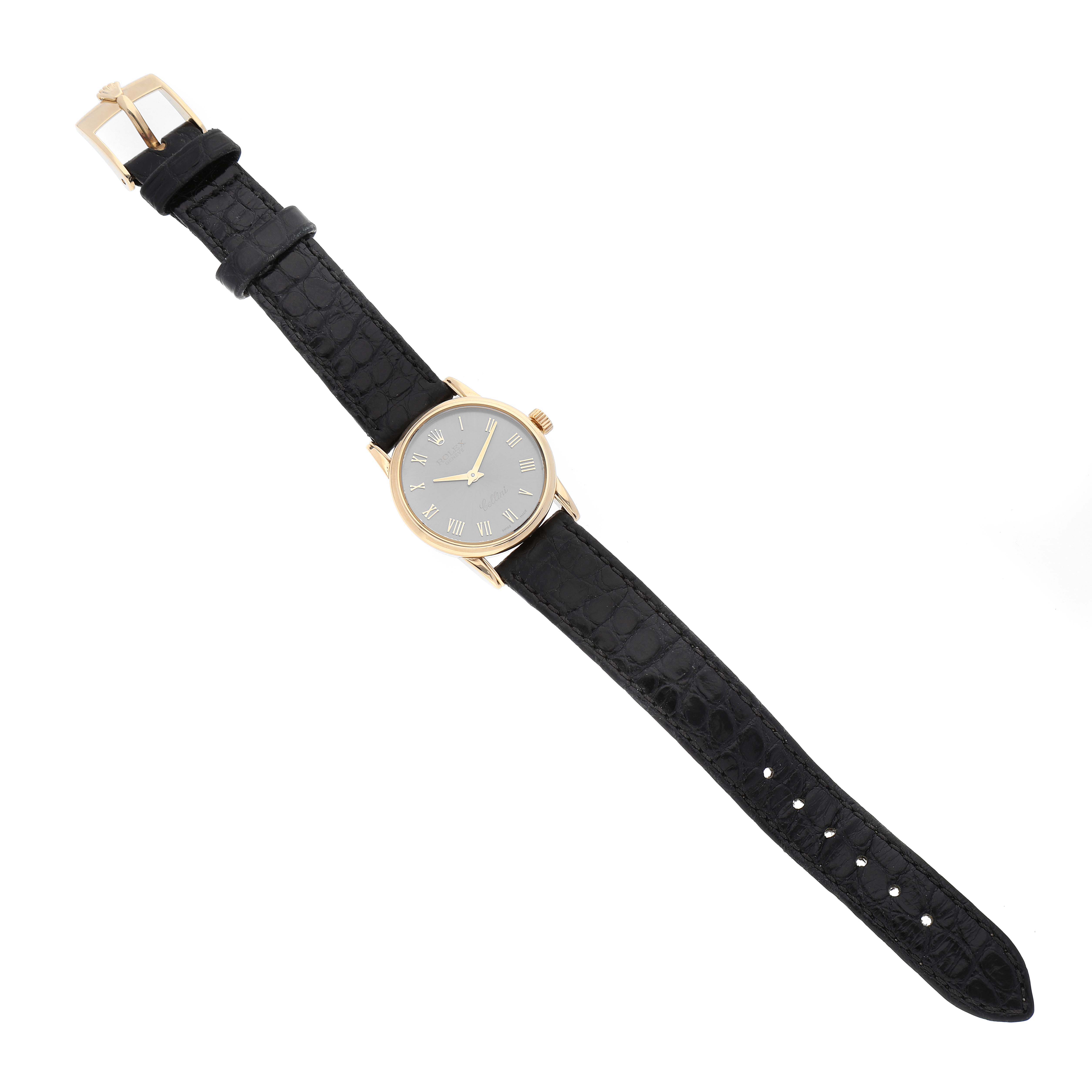 The Rolex Cellini 6111 Women's Yellow Gold Grey Dial 6111 Women's Yellow Gold Grey Dial watch is shown from a top-down angle, displaying the entire face and black leather strap.