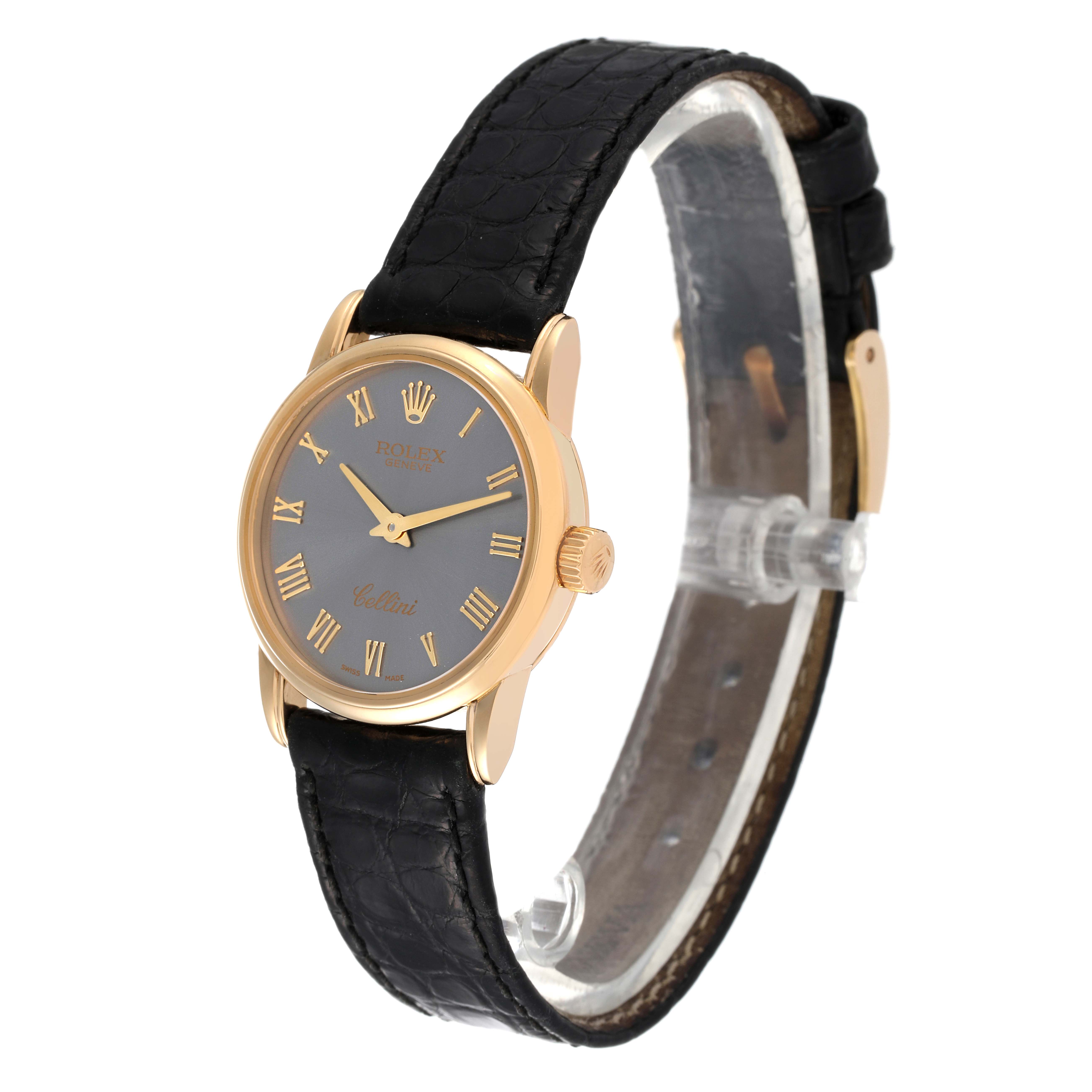 The image shows a side angle of the Rolex Cellini 6111 Women's Yellow Gold Grey Dial 6111 Women's Yellow Gold Grey Dial watch, featuring its black leather strap, gold case, and gray dial with Roman numerals.