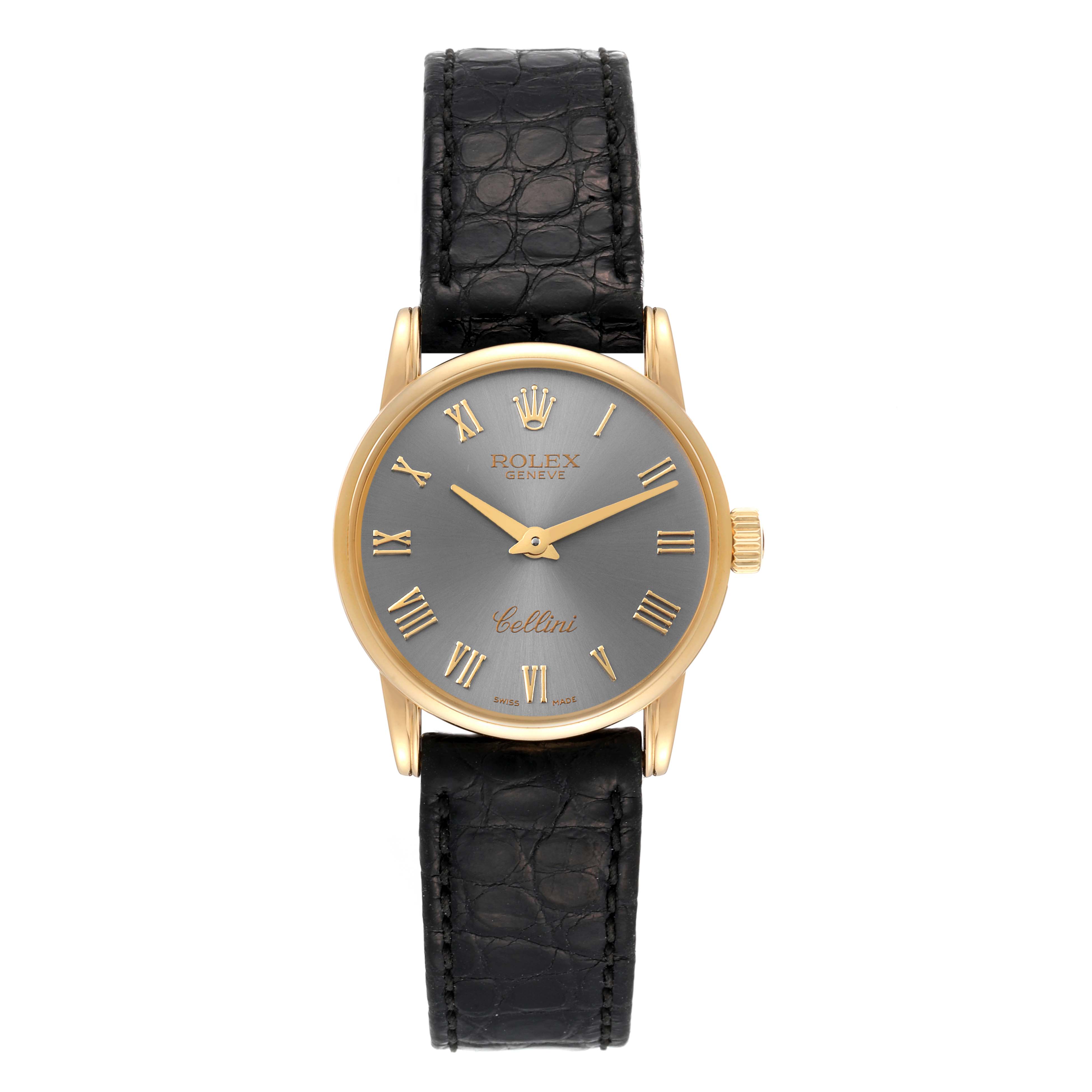 The image shows a front view of a Rolex Cellini 6111 Women's Yellow Gold Grey Dial 6111 Women's Yellow Gold Grey Dial watch with a gold case, black leather strap, and gray dial featuring Roman numerals.