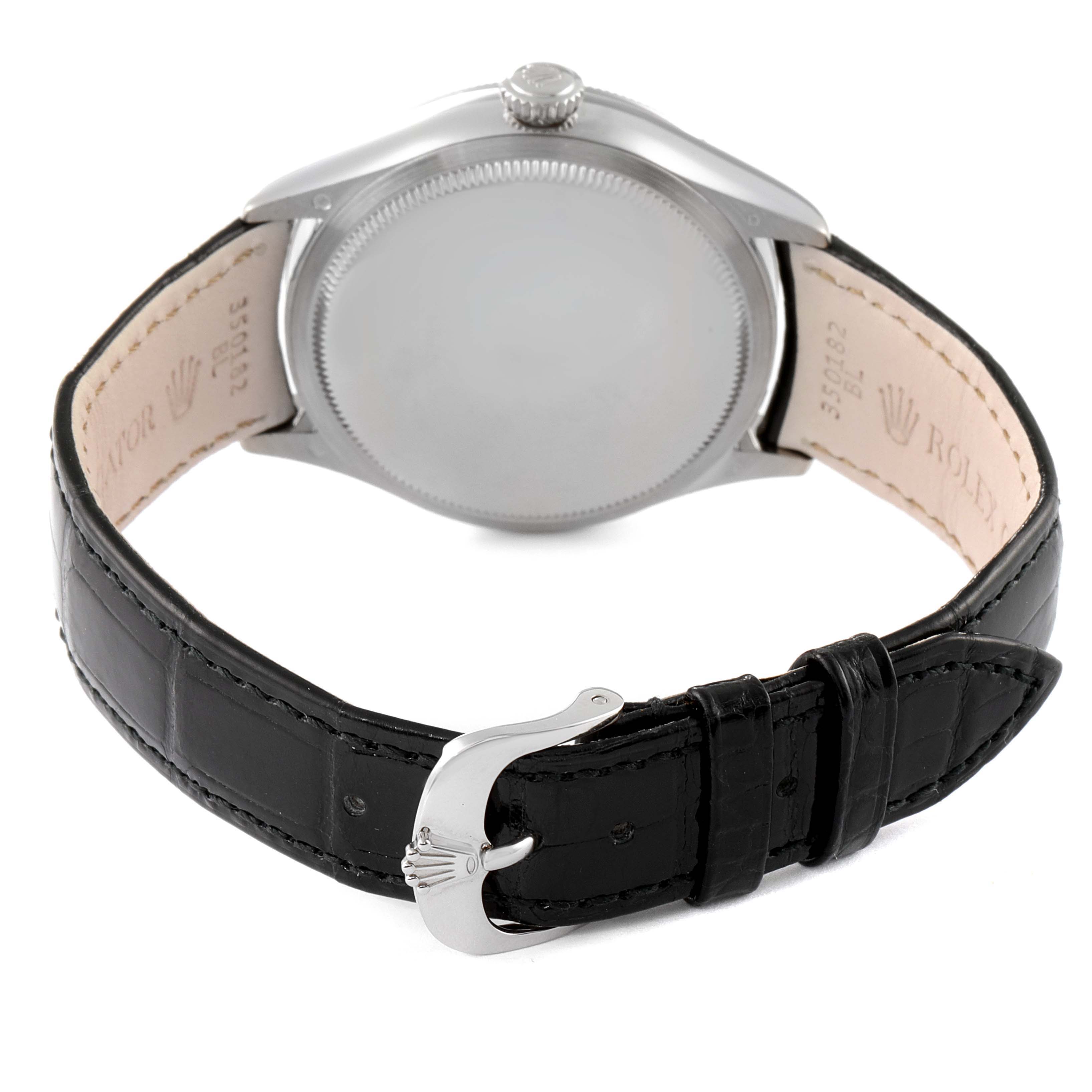 This image shows the back view of a Rolex Cellini 50519 Men's White Gold Black Dial 50519 Men's White Gold Black Dial watch, displaying the case back and the black leather strap with its buckle.