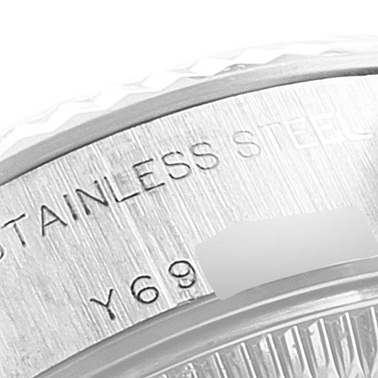 The image shows a close-up of the stainless steel case and part of the fluted bezel of a Rolex Datejust 79174 Women's Stainless Steel Silver Dial 79174 Women's Stainless Steel Silver Dial watch.