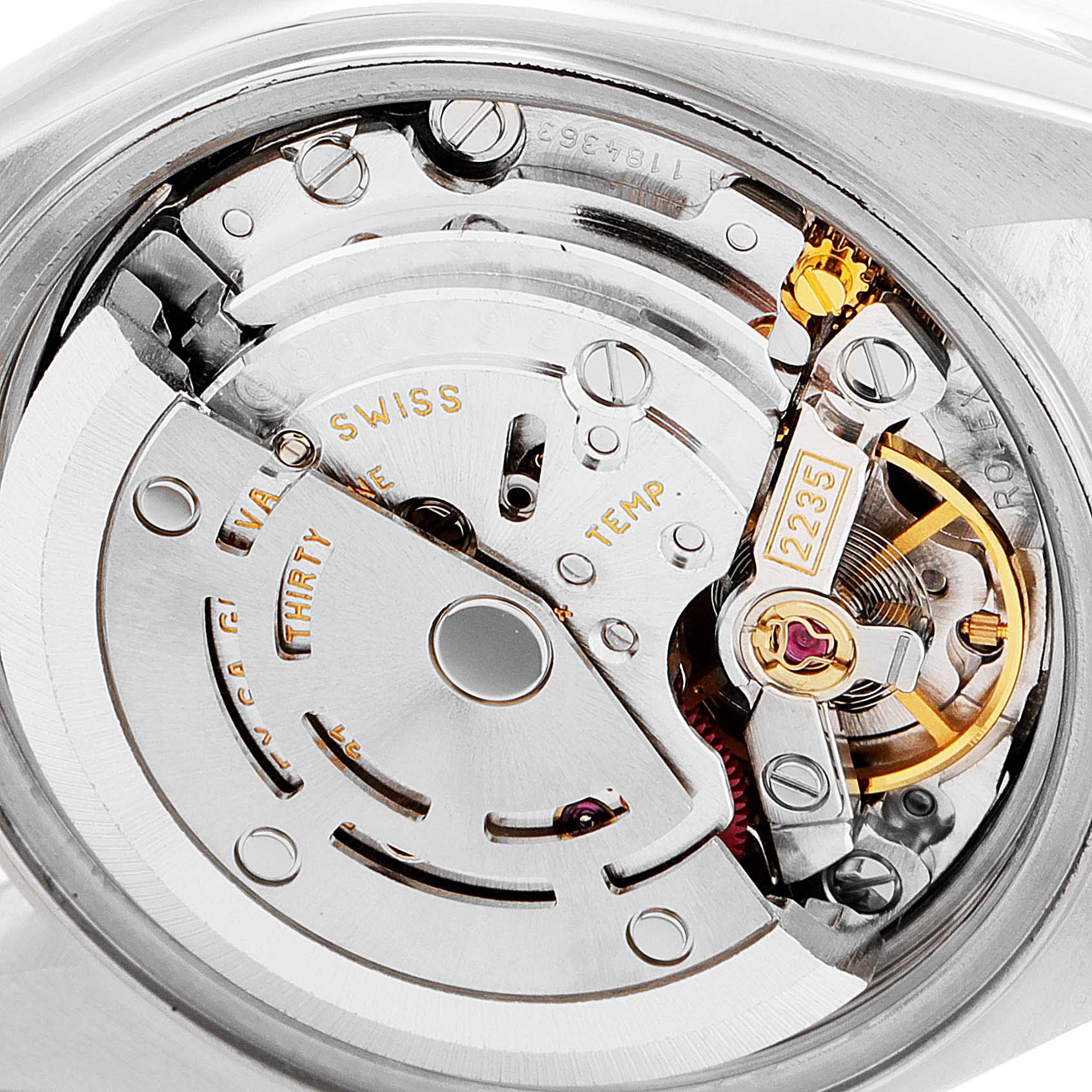 This image shows a close-up view of the movement inside a Rolex Datejust 79174 Women's Stainless Steel Silver Dial 79174 Women's Stainless Steel Silver Dial watch, highlighting its intricate internal components.