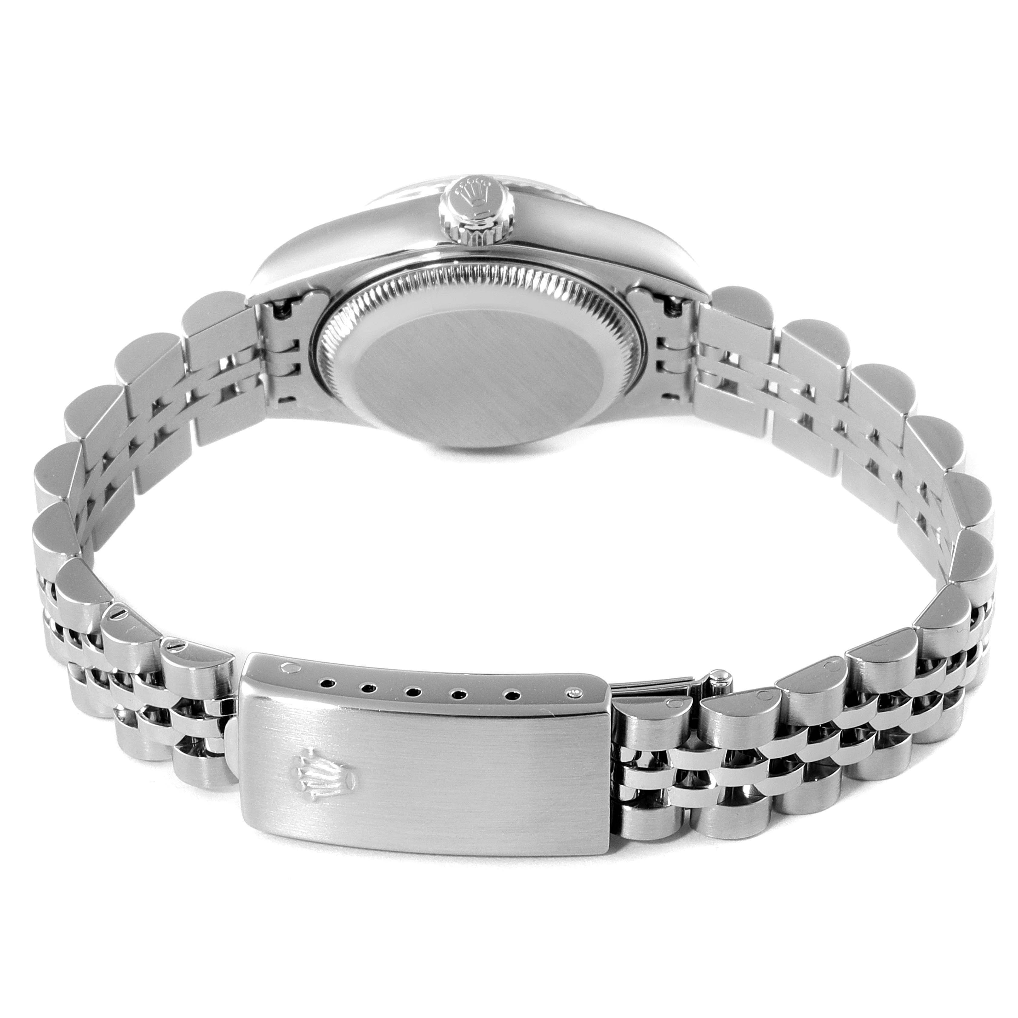 The image shows the back view of a Rolex Datejust 79174 Women's Stainless Steel Silver Dial 79174 Women's Stainless Steel Silver Dial watch, highlighting the case back and the clasp of the bracelet.