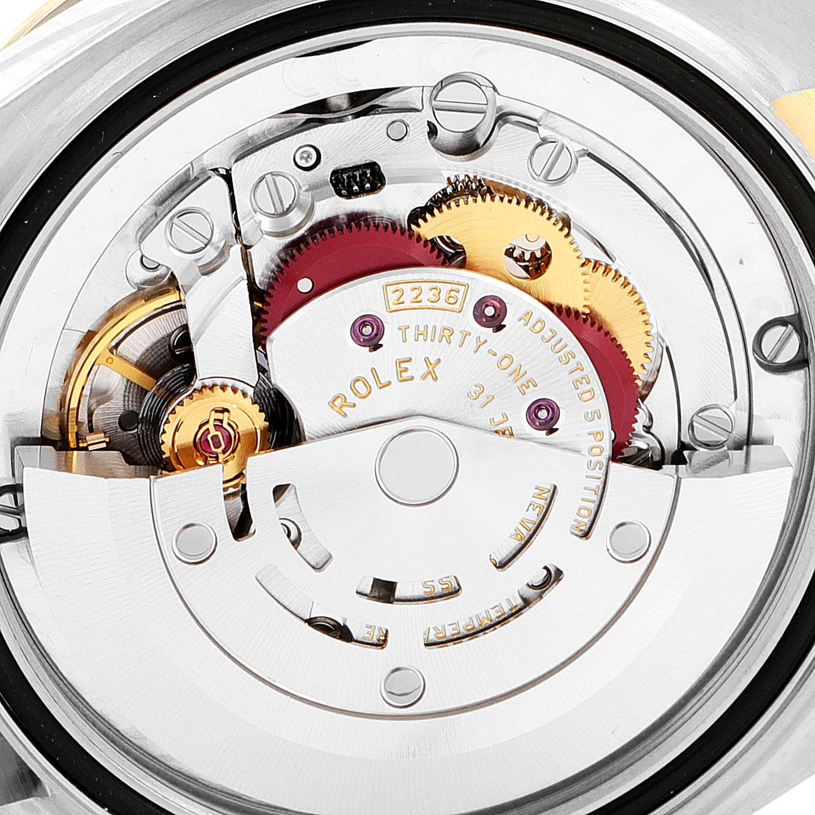 This image shows a close-up of the movement mechanism of a Rolex Mid-Size 278343 Women's Steel and Gold (two tone) Mother of Pearl Dial 278343 Women's Steel and Gold (two tone) Mother of Pearl Dial model watch.