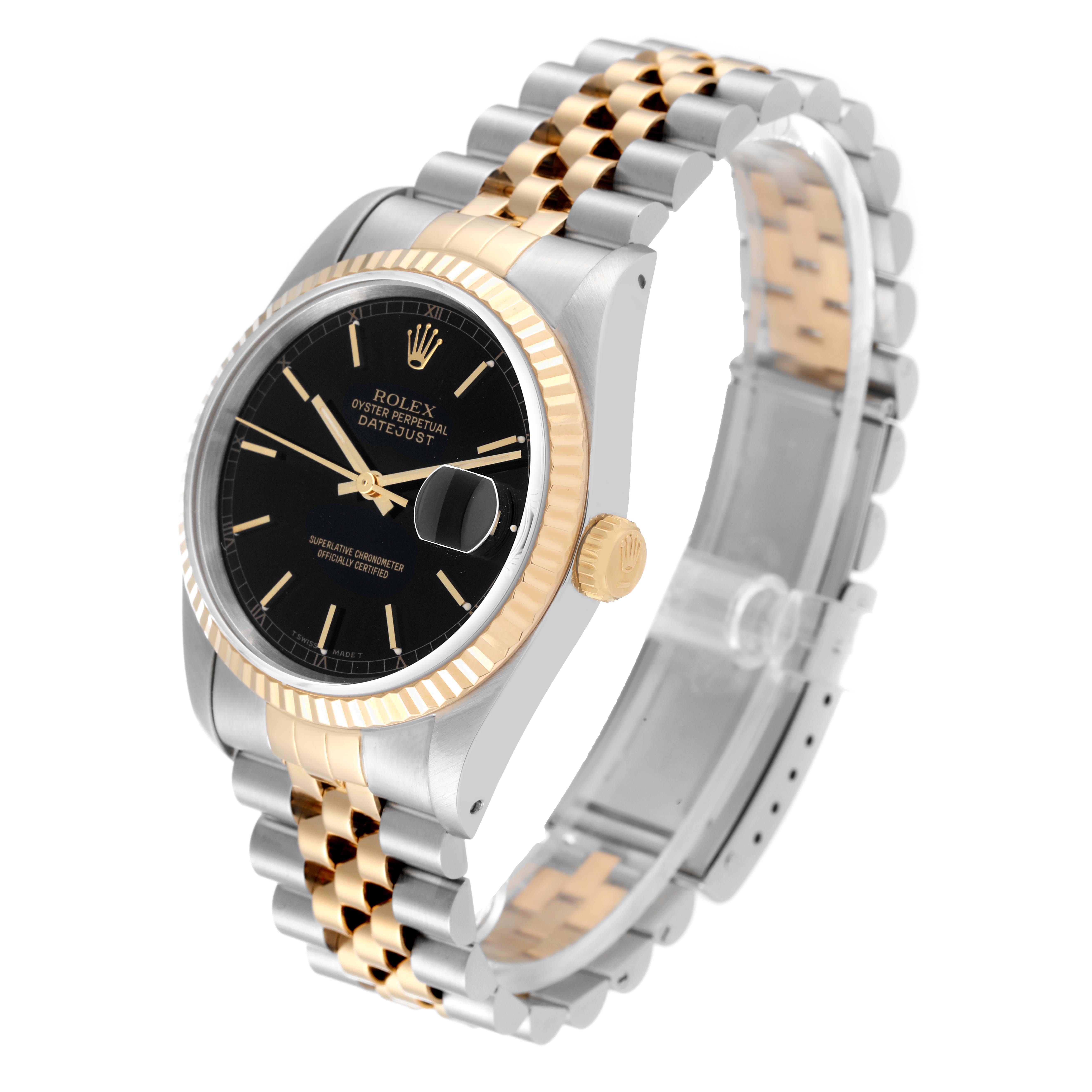 The image shows a Rolex Datejust 16233 Men's Steel and Gold (two tone) Black Dial 16233 Men's Steel and Gold (two tone) Black Dial watch at an angled top-down view, highlighting the black dial, fluted bezel, two-tone bracelet, and date window.