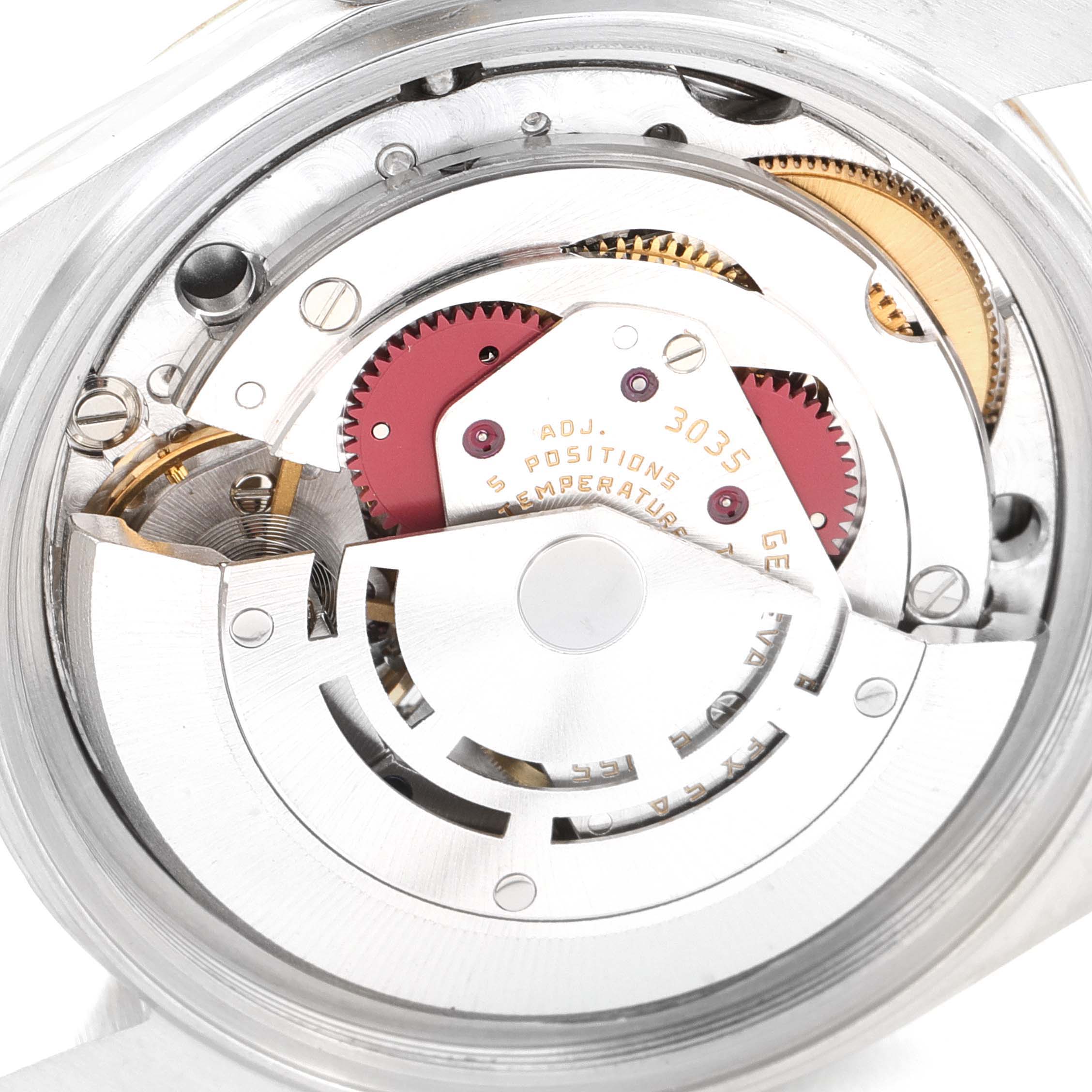 This image shows a close-up view of the inner mechanical parts of a Rolex Vintage Collection 16013 Men's Steel and Gold (two tone) Champagne Dial 16013 Men's Steel and Gold (two tone) Champagne Dial watch movement.