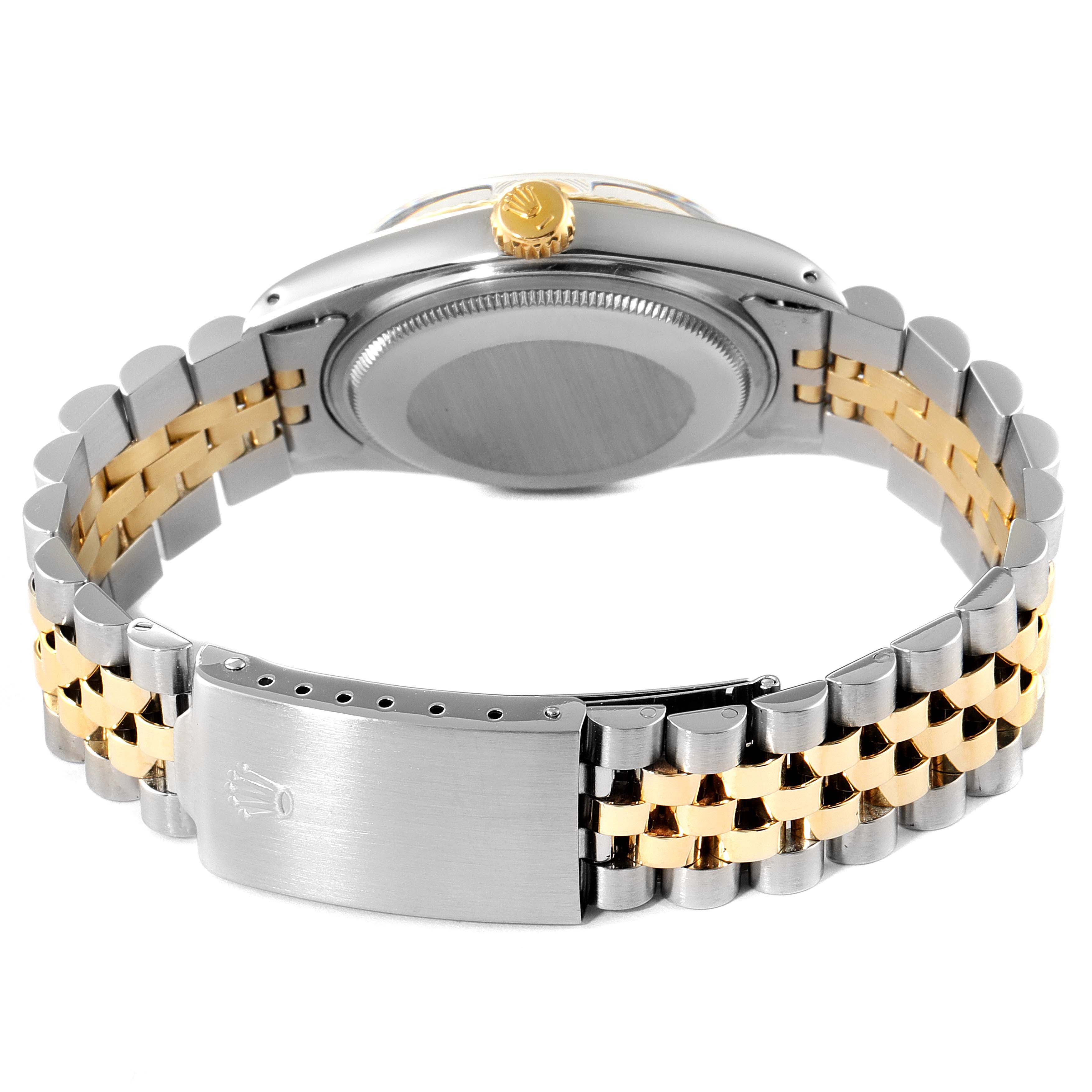 The image shows the back and bracelet of a Rolex Vintage Collection 16013 Men's Steel and Gold (two tone) Champagne Dial 16013 Men's Steel and Gold (two tone) Champagne Dial model watch, highlighting the clasp and screw-down case back.